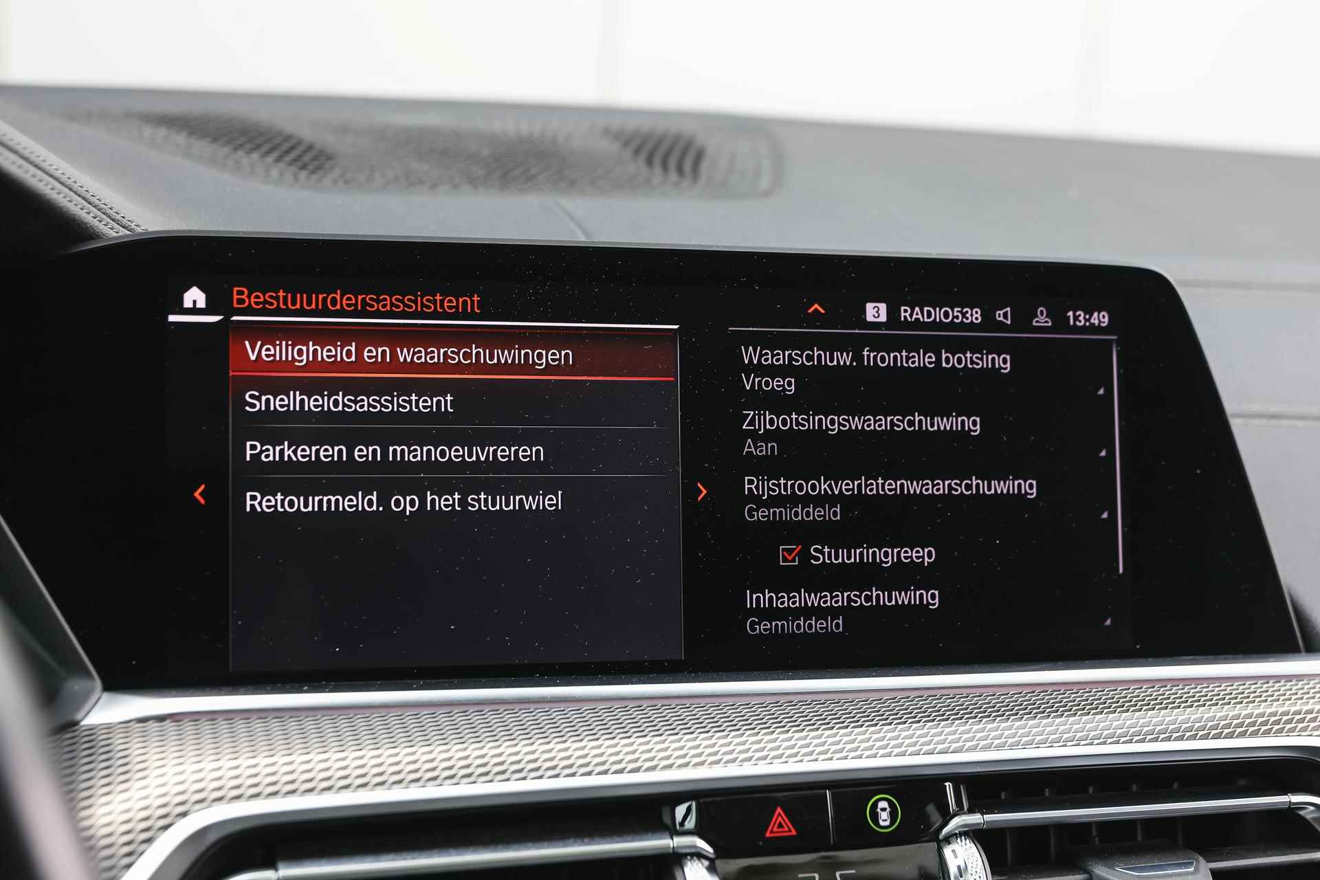 BMW X5 M50d High Executive Automaat / Panoramadak / Laserlight / Head-Up / Harman Kardon / Live Cockpit Professional / Gesture Control / Parking Assistant - 31/44