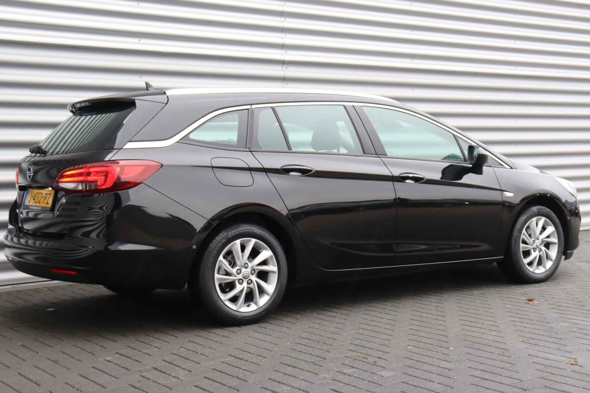 Opel Astra SPORTS TOURER 1.2 TURBO 130PK ELEGANCE+ / NAVI / LEDER / CLIMA / AGR / PDC / 16" LMV / CAMERA / KEYLESS / LED-MATRIX / FULL-OPTI - 7/43