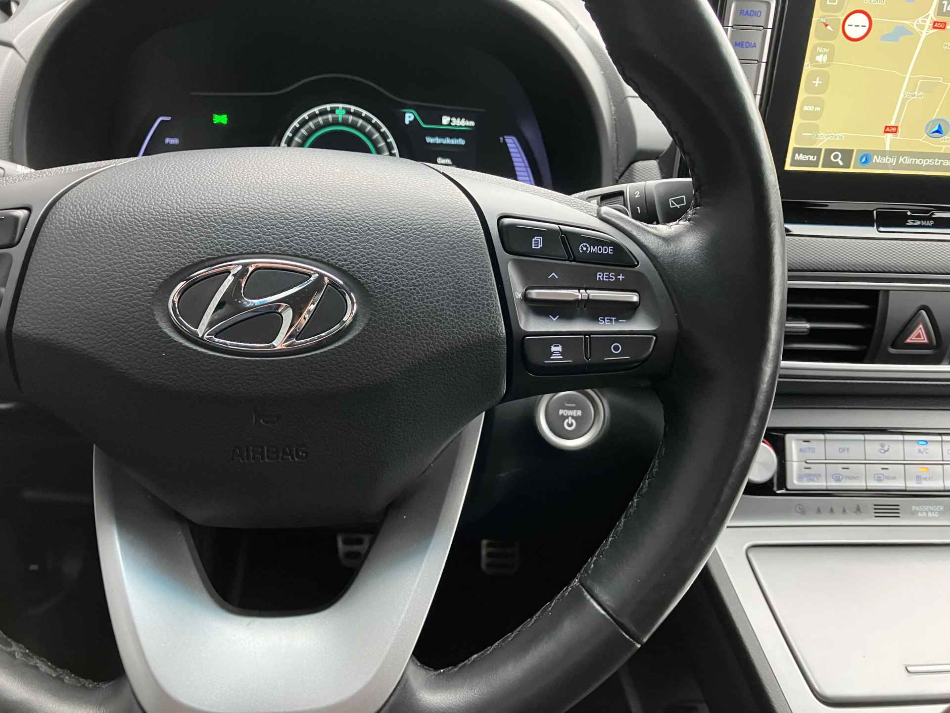 Hyundai KONA EV Premium 64 kWh | dealer onderhouden | leder | navigatie | stoel/stuurverw. | adapt. cruise | trekhaak | incl. zomerset - 27/40