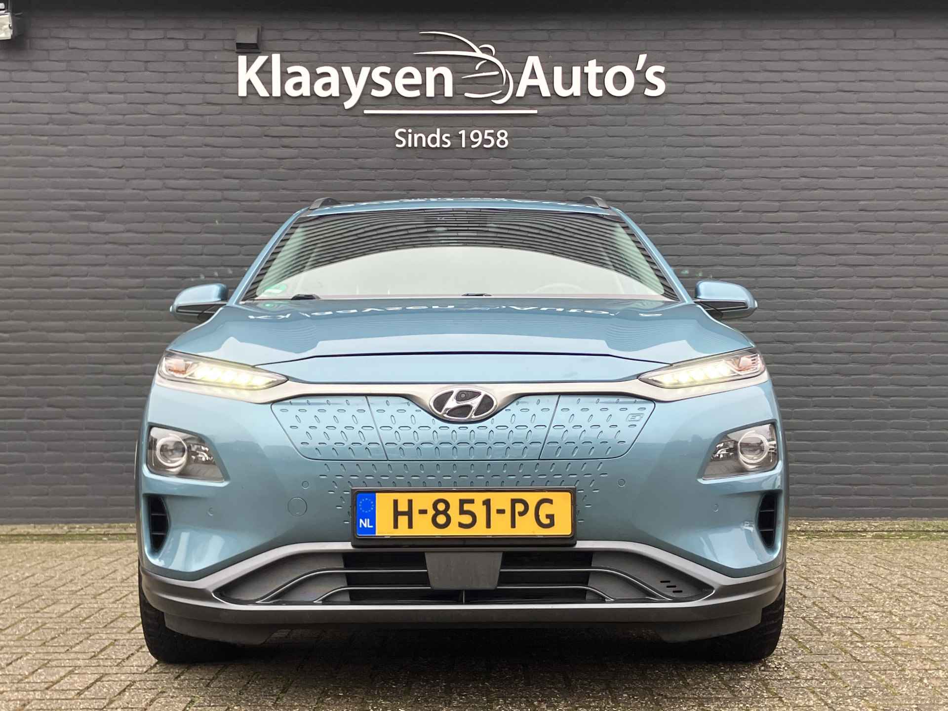 Hyundai KONA EV Premium 64 kWh | dealer onderhouden | leder | navigatie | stoel/stuurverw. | adapt. cruise | trekhaak | incl. zomerset - 3/40