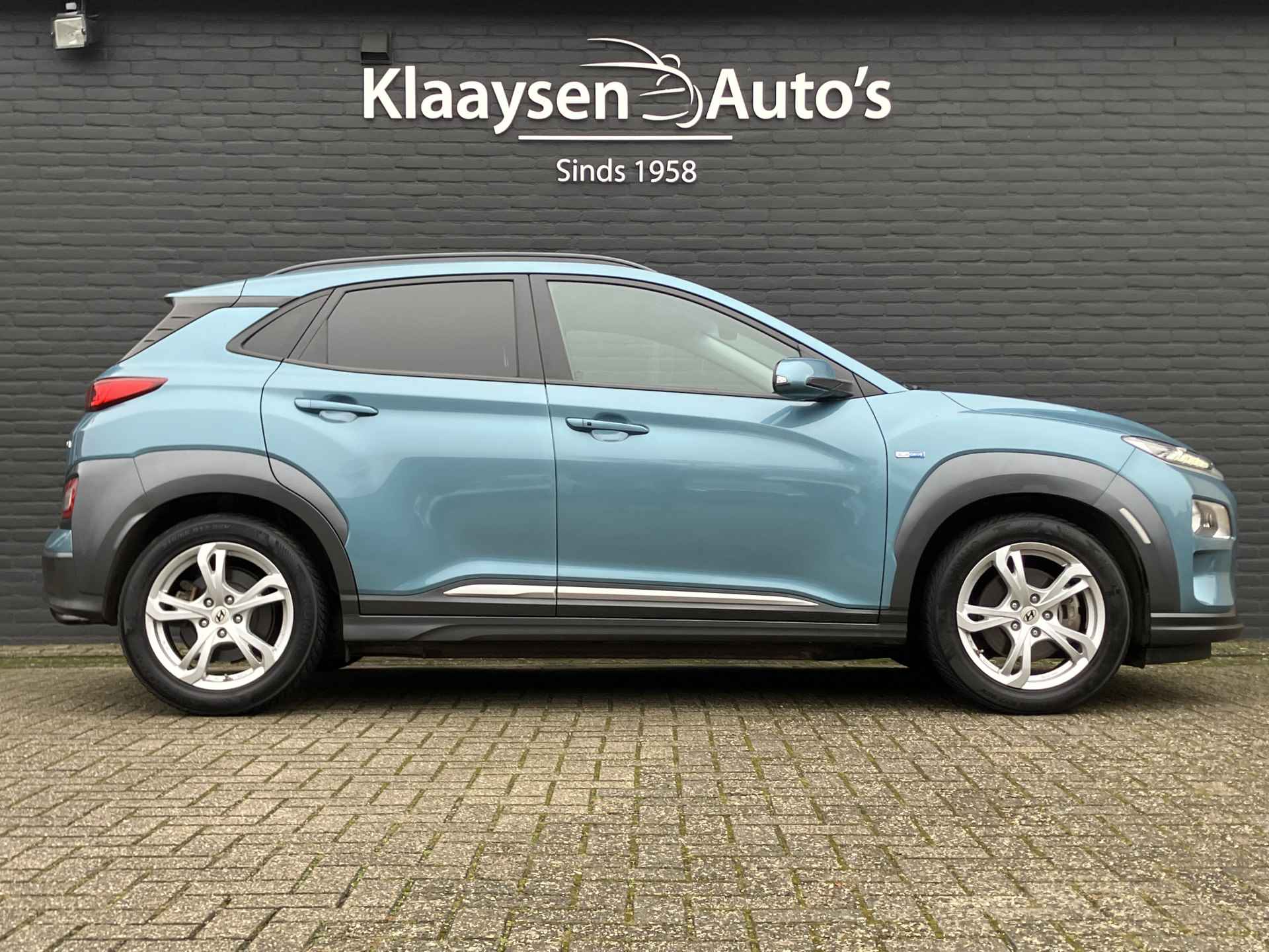 Hyundai KONA EV Premium 64 kWh | dealer onderhouden | leder | navigatie | stoel/stuurverw. | adapt. cruise | trekhaak | incl. zomerset - 5/40