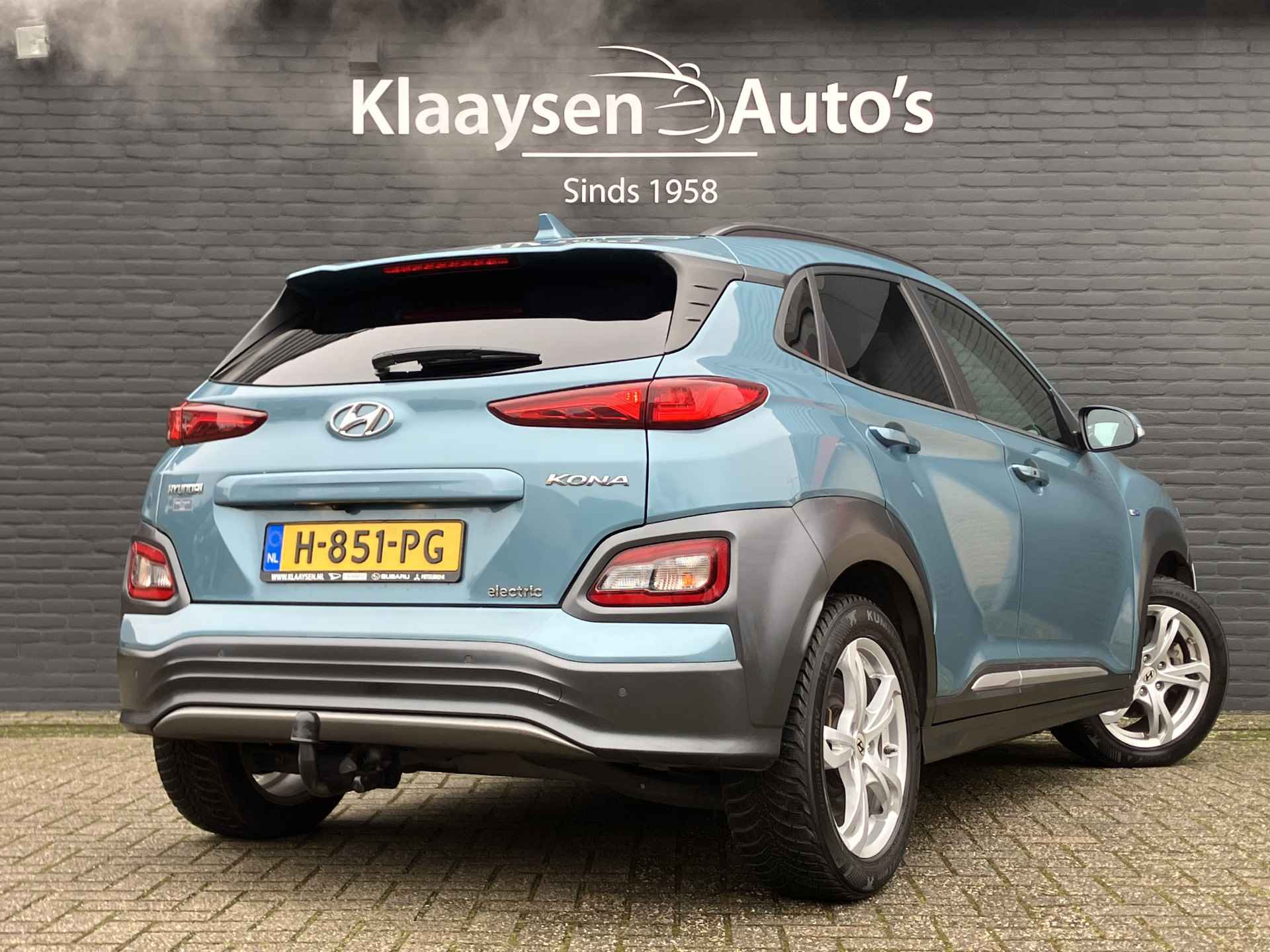 Hyundai KONA EV Premium 64 kWh | dealer onderhouden | leder | navigatie | stoel/stuurverw. | adapt. cruise | trekhaak | incl. zomerset - 6/40