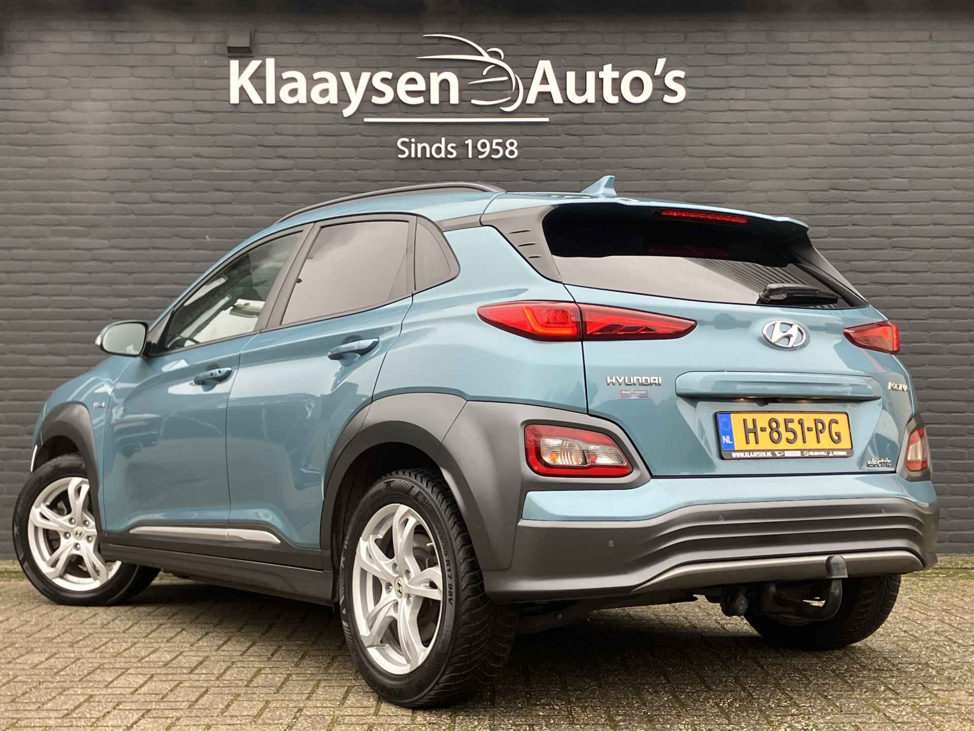 Hyundai KONA EV Premium 64 kWh | dealer onderhouden | leder | navigatie | stoel/stuurverw. | adapt. cruise | trekhaak | incl. zomerset - 8/40