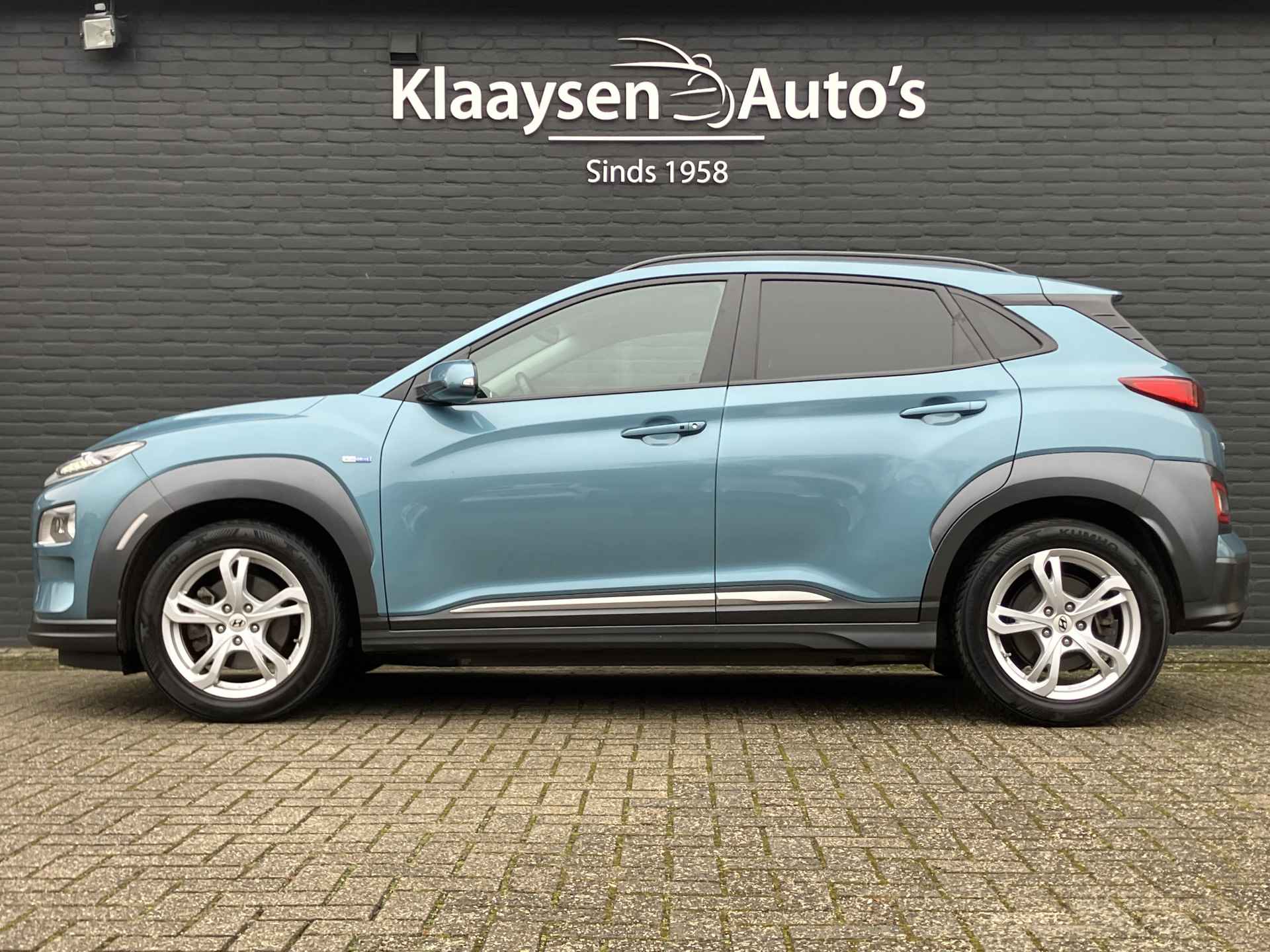 Hyundai KONA EV Premium 64 kWh | dealer onderhouden | leder | navigatie | stoel/stuurverw. | adapt. cruise | trekhaak | incl. zomerset - 9/40