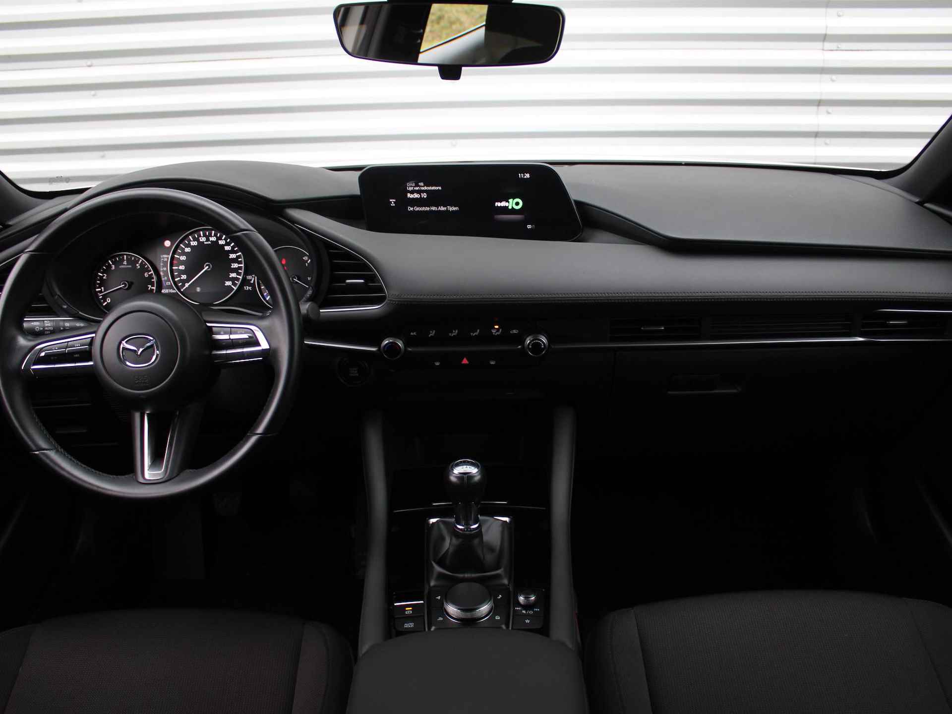 Mazda 3 2.0 e-SkyActiv-G M Hybrid 122 | Trekhaak | Navi | 16" LM | Airco | Cruise adapt. | HUD | PDC | - 9/36