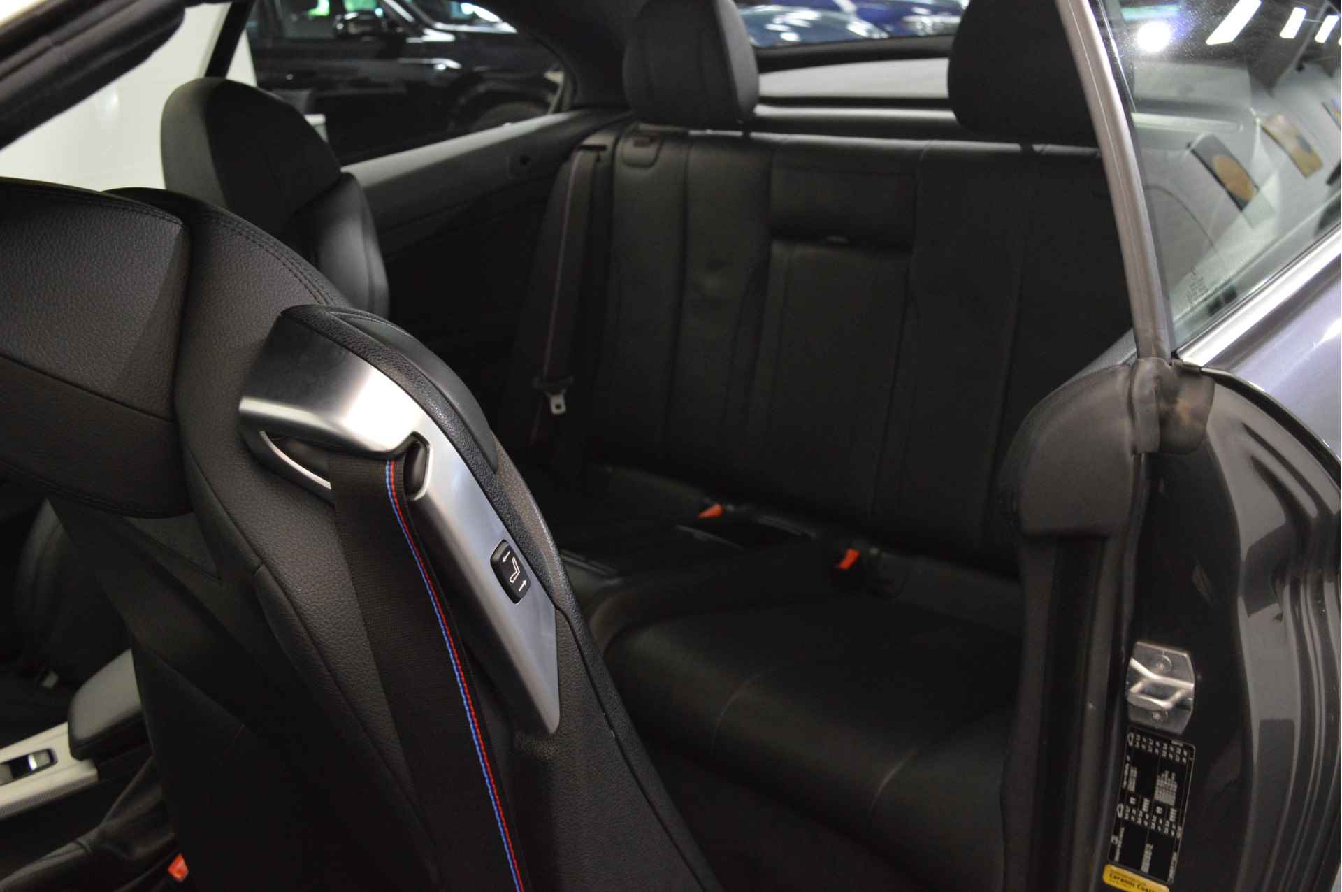 BMW 4 Serie Cabrio 420i High Executive M Sport Automaat / Achteruitrijcamera / Sportstoelen / Head-Up / Park Assistant / Comfort Access / Navigatie Professional - 12/26