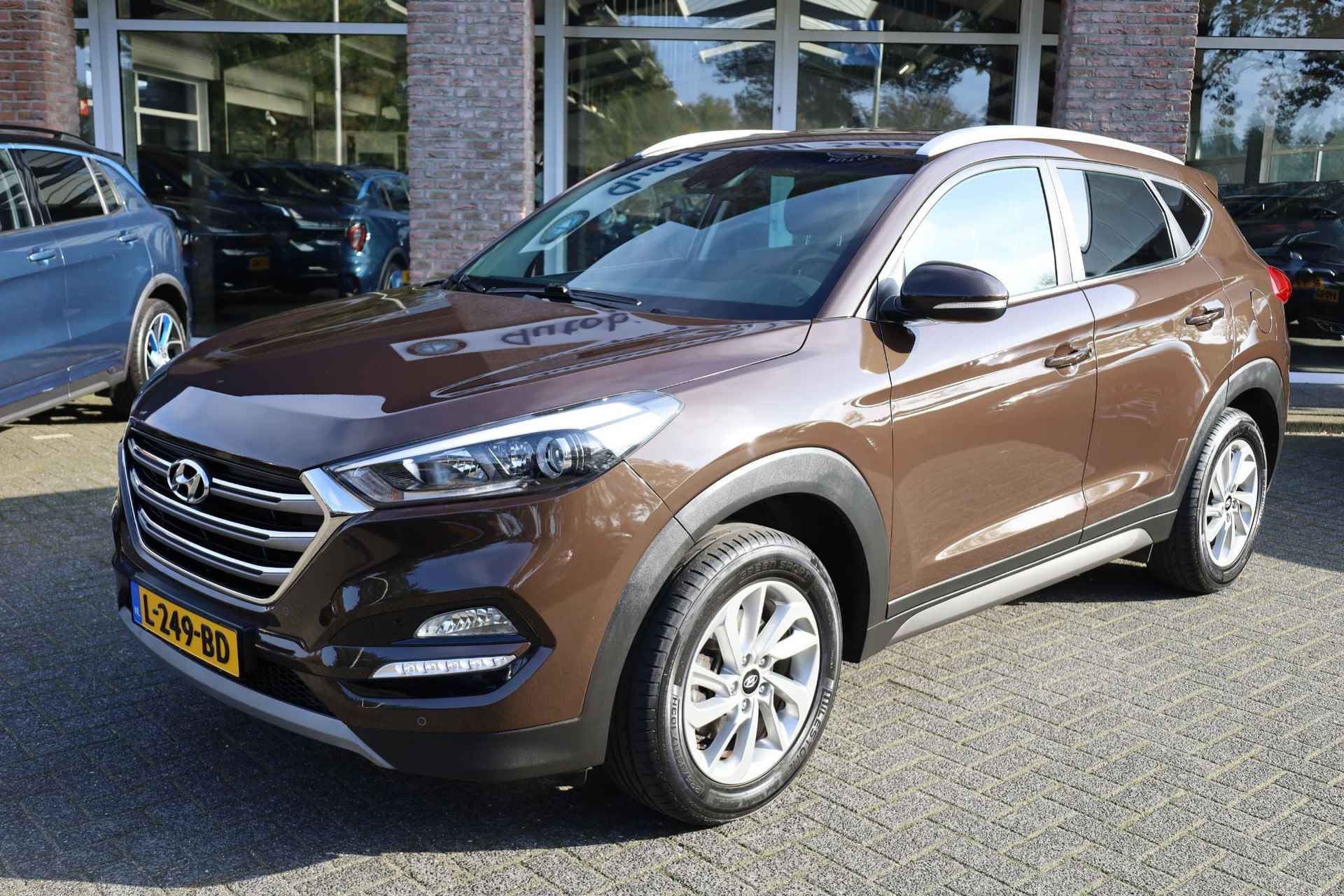 Hyundai Tucson 1.6 GDi Premium CAMERA LEER 4xSTOELVERWARMING TREKHAAK NAVI 17"LMV 2xKEYLESS ENZ - 60/62