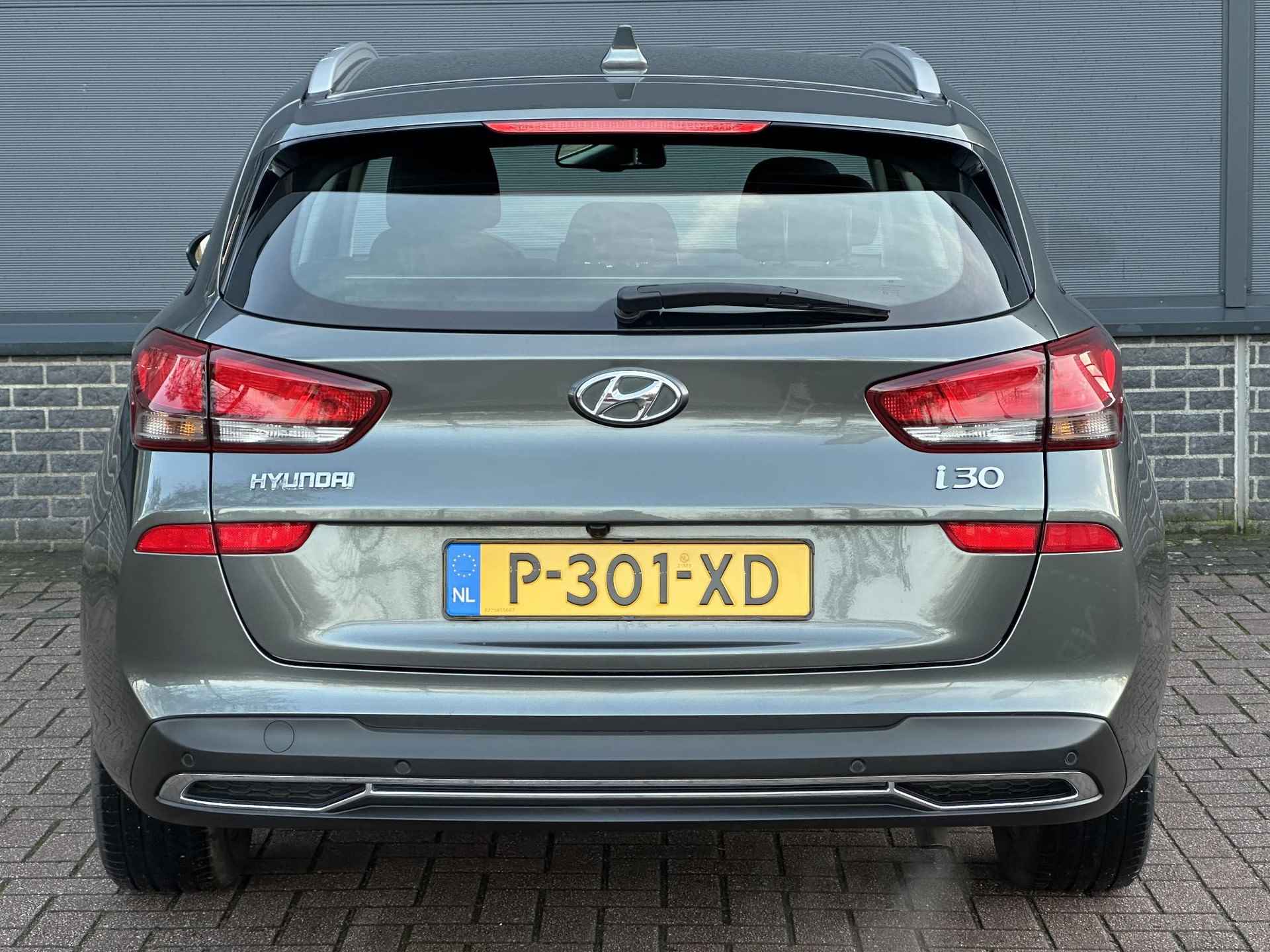 Hyundai i30 Wagon 1.0 T-GDi MHEV Comfort Smart / Navigatie / Achteruitrij camera / Keyless / Climate control / Apple carplay&Android auto / - 23/31