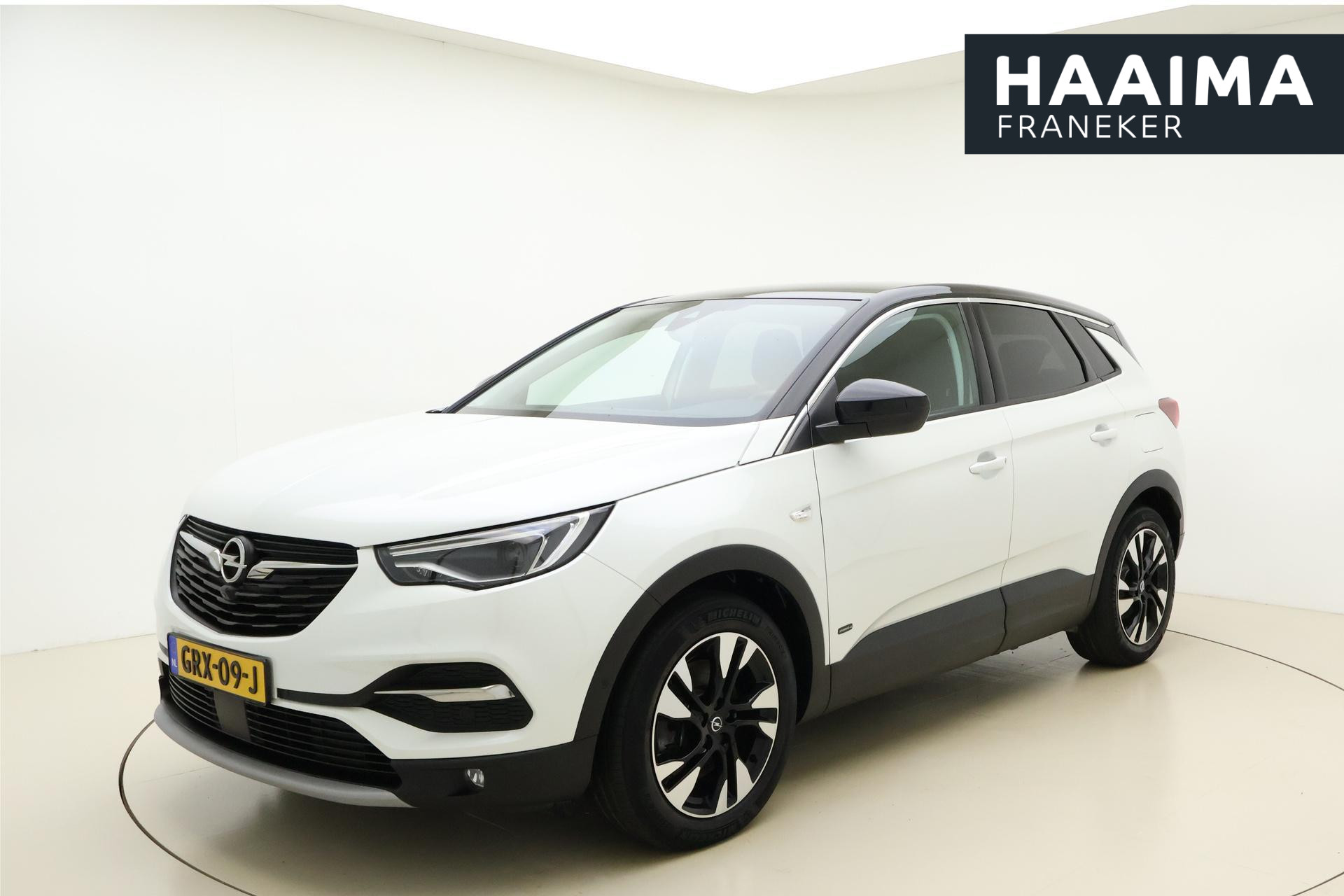 Opel Grandland X 1.6 Turbo Hybrid4 Elegance 300 PK | Navigatie | Keyless | 36 Camera | Zwart dak | Electrische achterklep | Lichtmetalen velgen | AGR