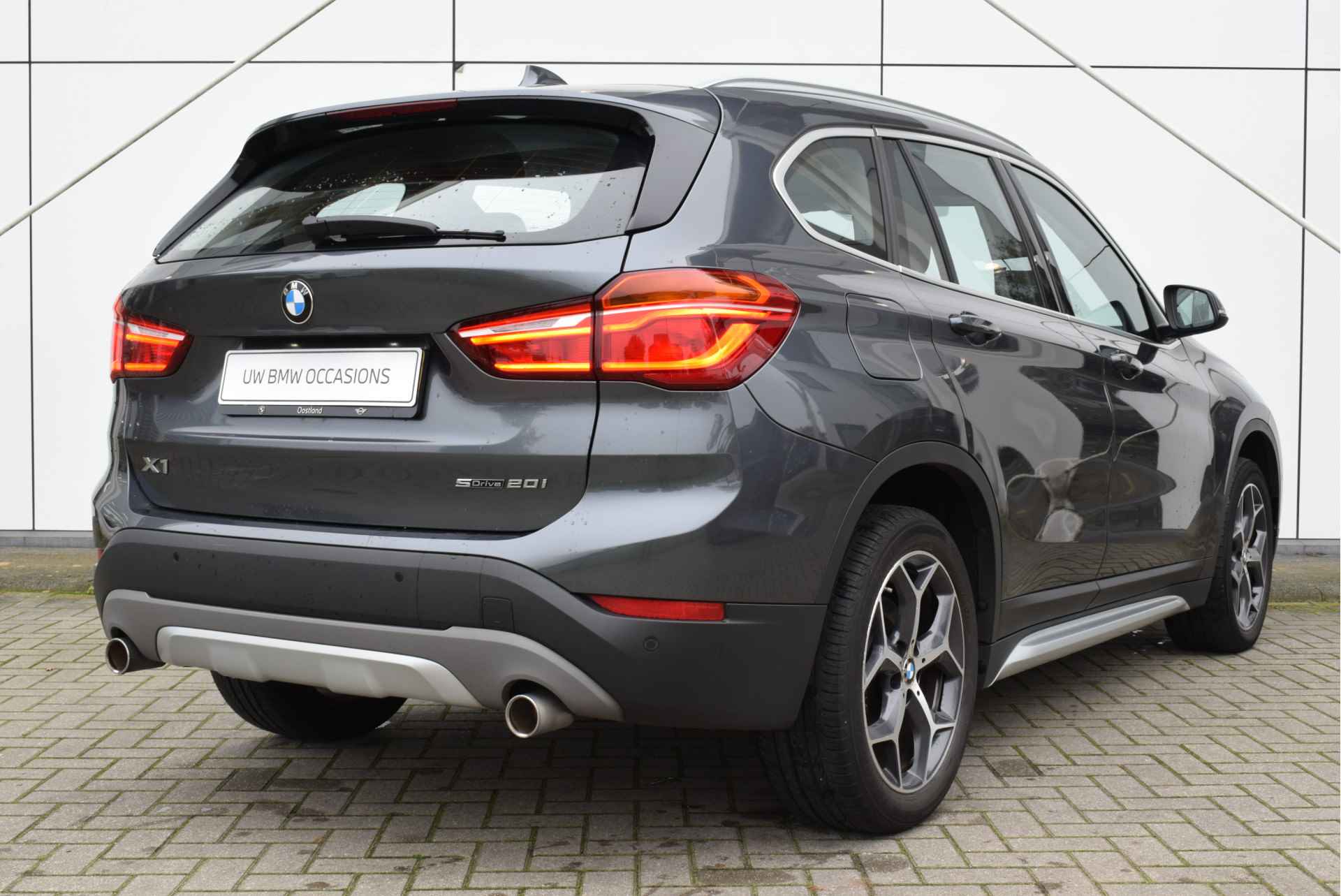 BMW X1 sDrive20i High Executive xLine Automaat / Panoramadak / Sportstoelen / LED / Head-Up / Park Assistant / Stoelverwarming - 7/13