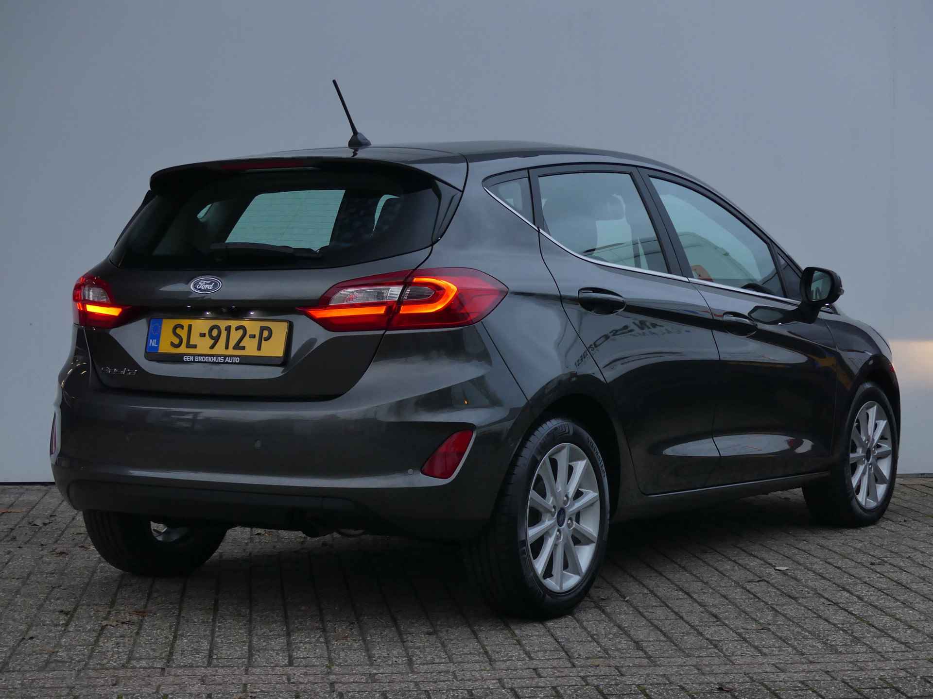 Ford Fiesta 1.0 EcoBoost 100PK Titanium | ADAPTIVE CRUISE | NAVI | CAMERA | PARKEERSENSOREN V+A | - 10/28