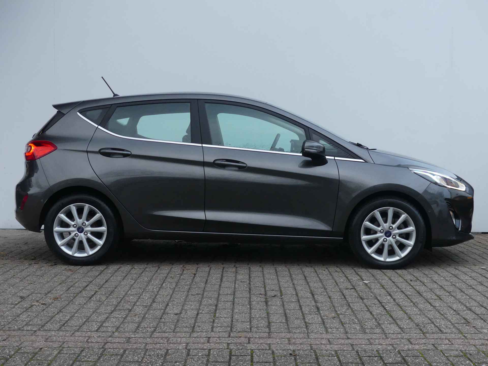 Ford Fiesta 1.0 EcoBoost 100PK Titanium | ADAPTIVE CRUISE | NAVI | CAMERA | PARKEERSENSOREN V+A | - 27/28