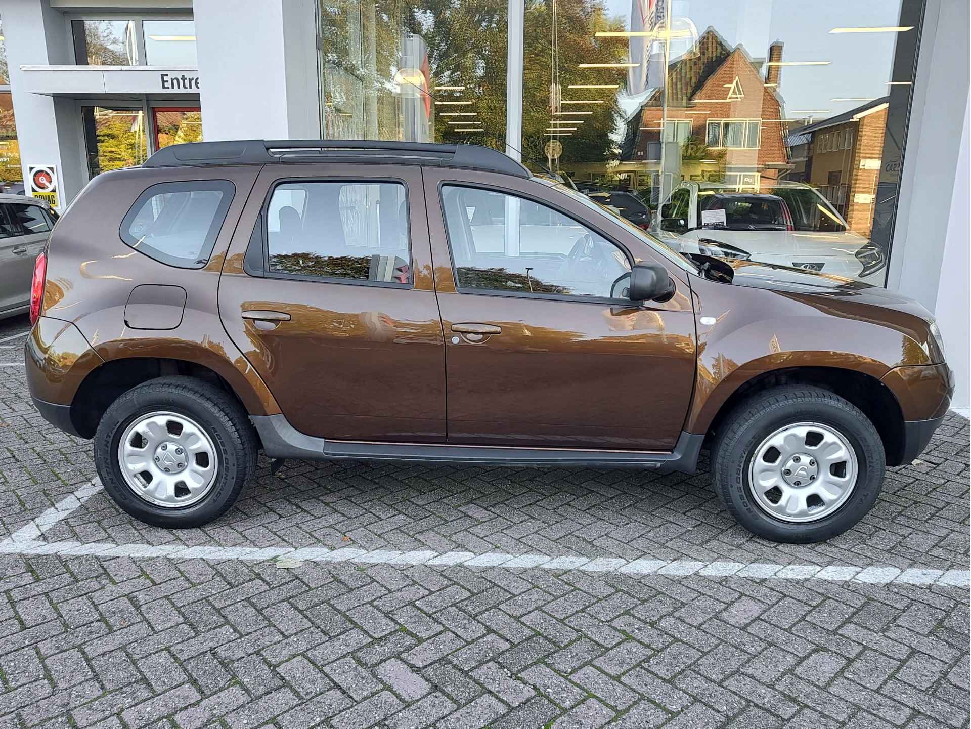 Dacia Duster 1.6 LAURÉATE 2WD Trekhaak | Airco | Elektrische ramen - 7/29