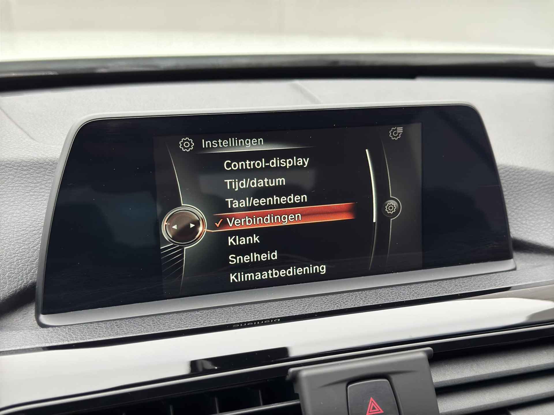 BMW 4-serie Cabrio 430i Centennial High Executive / Stoelverwarming / Parkeersensoren voor en achter / Navigatie / Lederen bekleding - 31/44