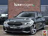 BMW 3 Serie Touring M340i xDrive Pano ACC H/K Laser Standk HUD Adp-onderstel El-zetels