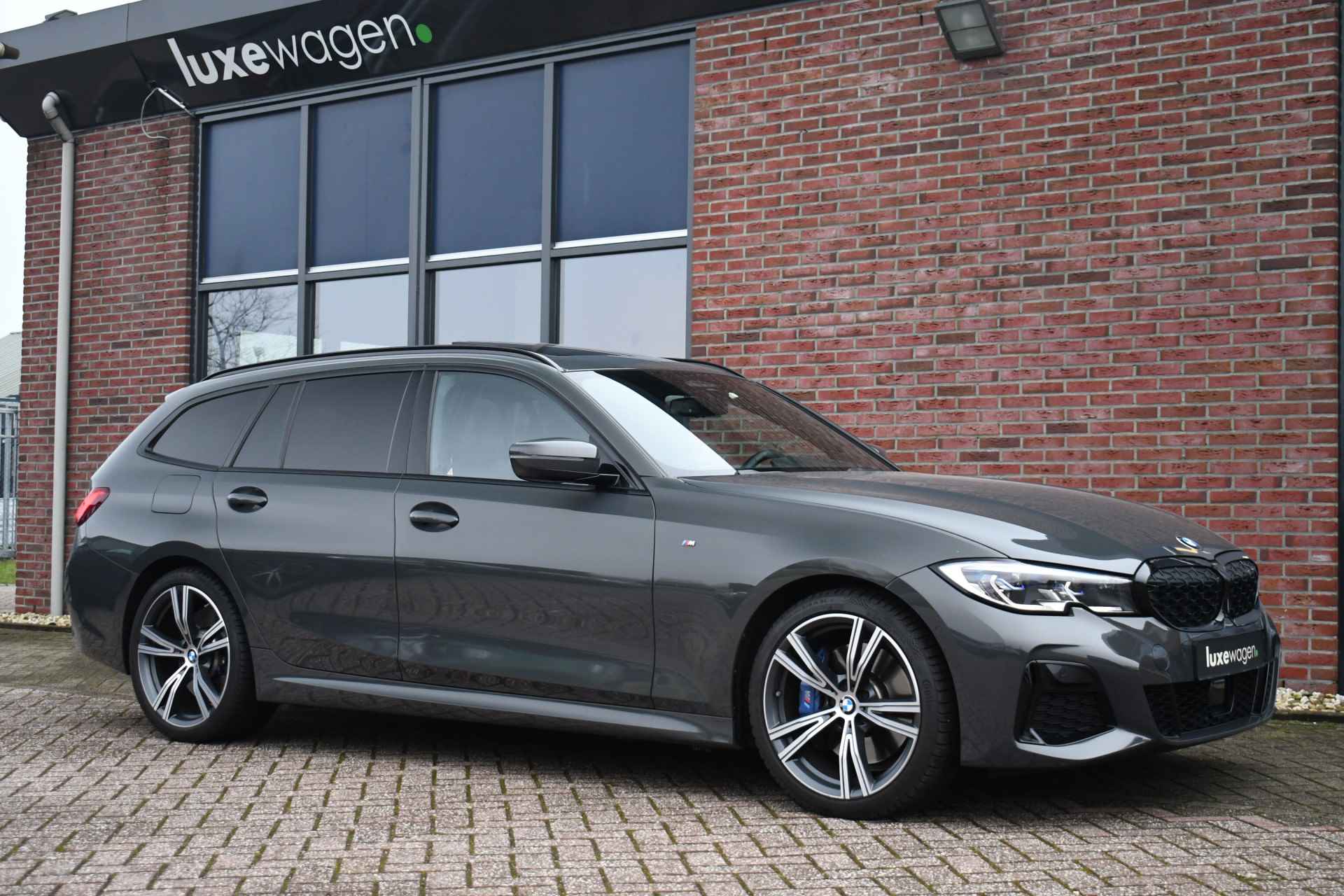 BMW 3 Serie Touring M340i xDrive Pano ACC H/K Laser Standk HUD Adp-onderstel El-zetels - 5/97