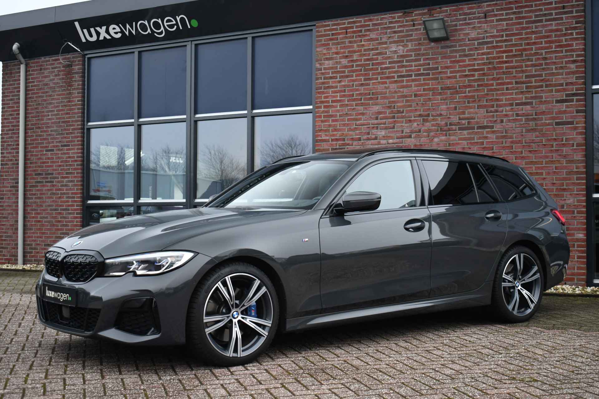 BMW 3 Serie Touring M340i xDrive Pano ACC H/K Laser Standk HUD Adp-onderstel El-zetels - 31/97