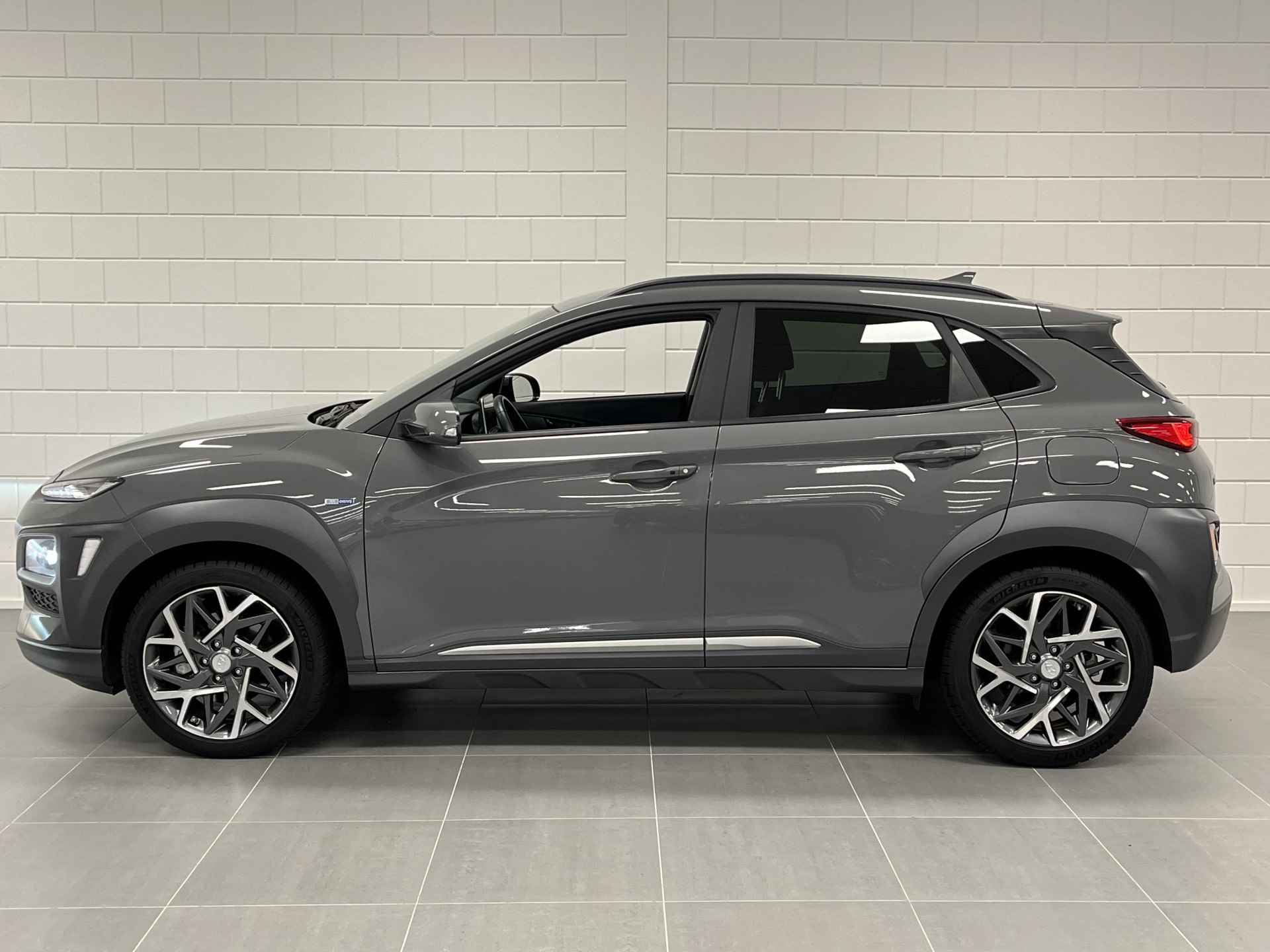 Hyundai KONA 1.6 GDI HEV Premium FULL LED | LEDER | 18 INCH VELGEN | ZEER COMPLEET | UNIEKE KILOMETERSTAND! - 9/49