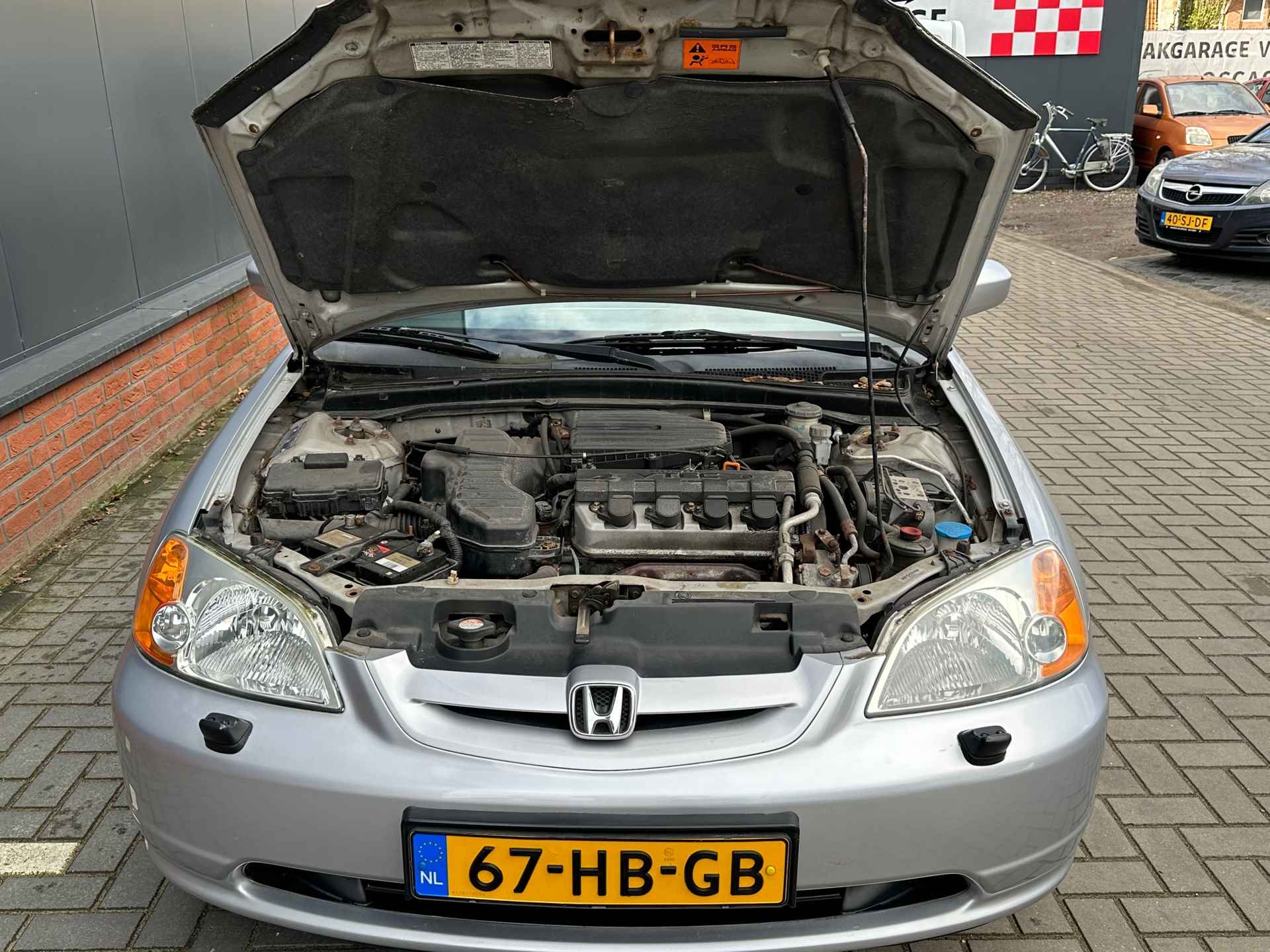 Honda Civic Coupé 1.7i ES - 31/32