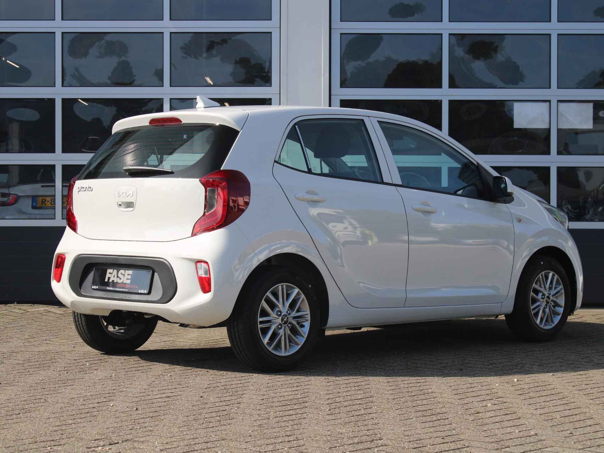 Kia Picanto 1.0 DPi DynamicLine | Voorraad | Airco | Cruise | Camera | Apple Carplay | 14" - 2/26