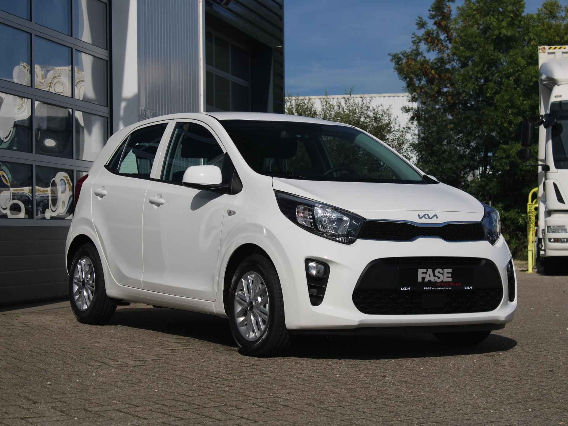 Kia Picanto 1.0 DPi DynamicLine | Voorraad | Airco | Cruise | Camera | Apple Carplay | 14" - 3/26