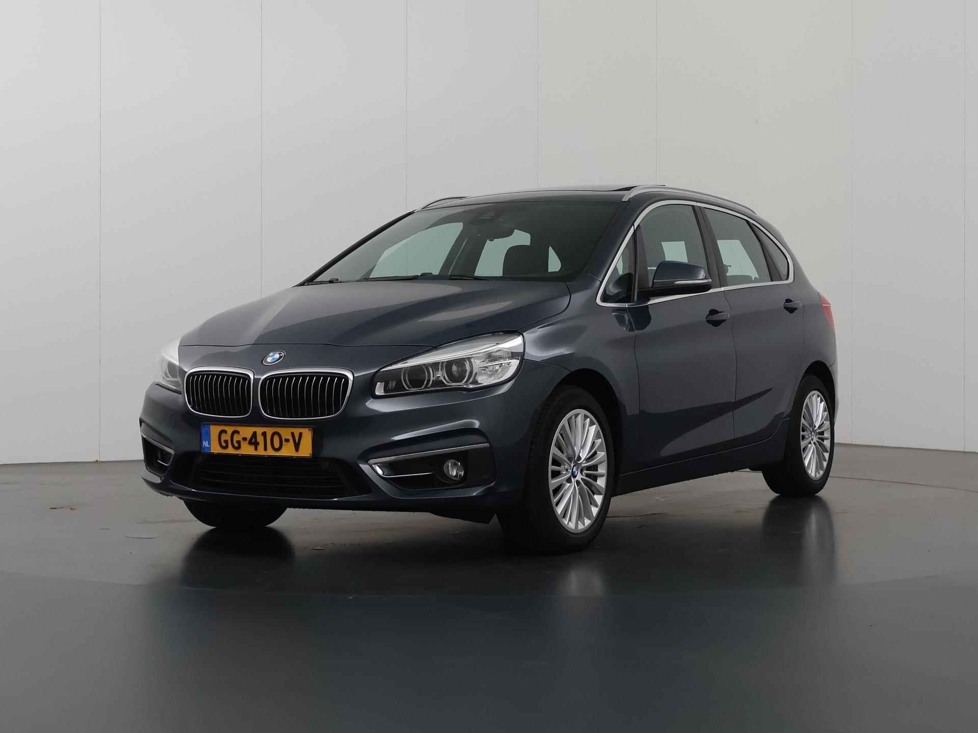 BMW 2-serie Active Tourer 220i Luxury | Lederen interieur | HUD | Sportstoelen | Panoramadak | Navigatie | Stoelen + geheugen | Stoelverwarming | Parkeersensoren | - 39/39