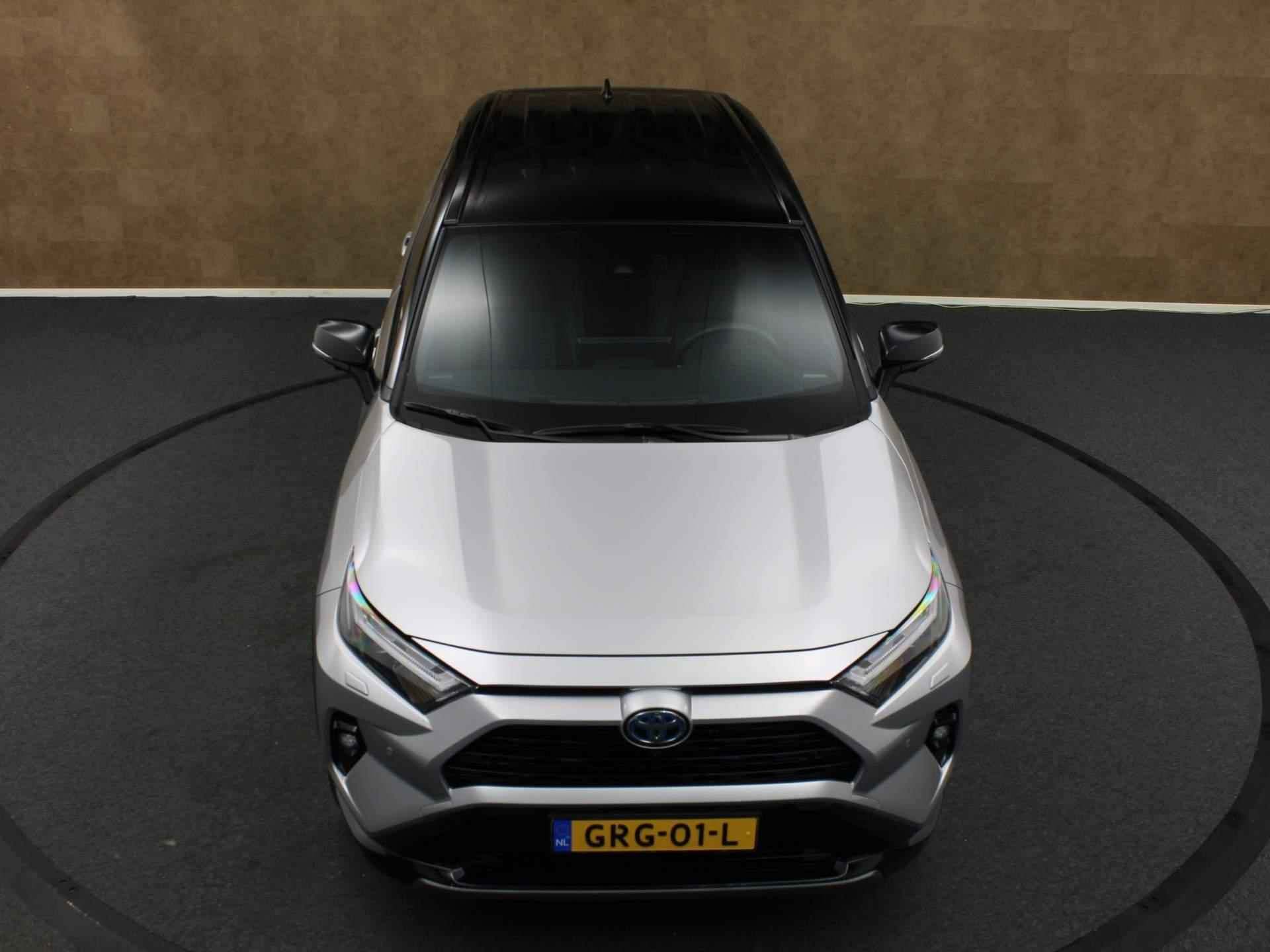 Toyota RAV4 2.5 Hybrid Style  - NAVIGATIE - TWO TONE LAK - VOORRRUITVERWARMING - ELEKTRISCH BEDIENBARE ACHTERKLEP - 19 INCH LICHT METALEN VELGEN - JBL AUDIO - ELEKTRISCH VERSTELBARE VOORSTOEL - DODEHOEK DETECTIE - STUURVERWARMING - STOELVERWARMING - 16/44