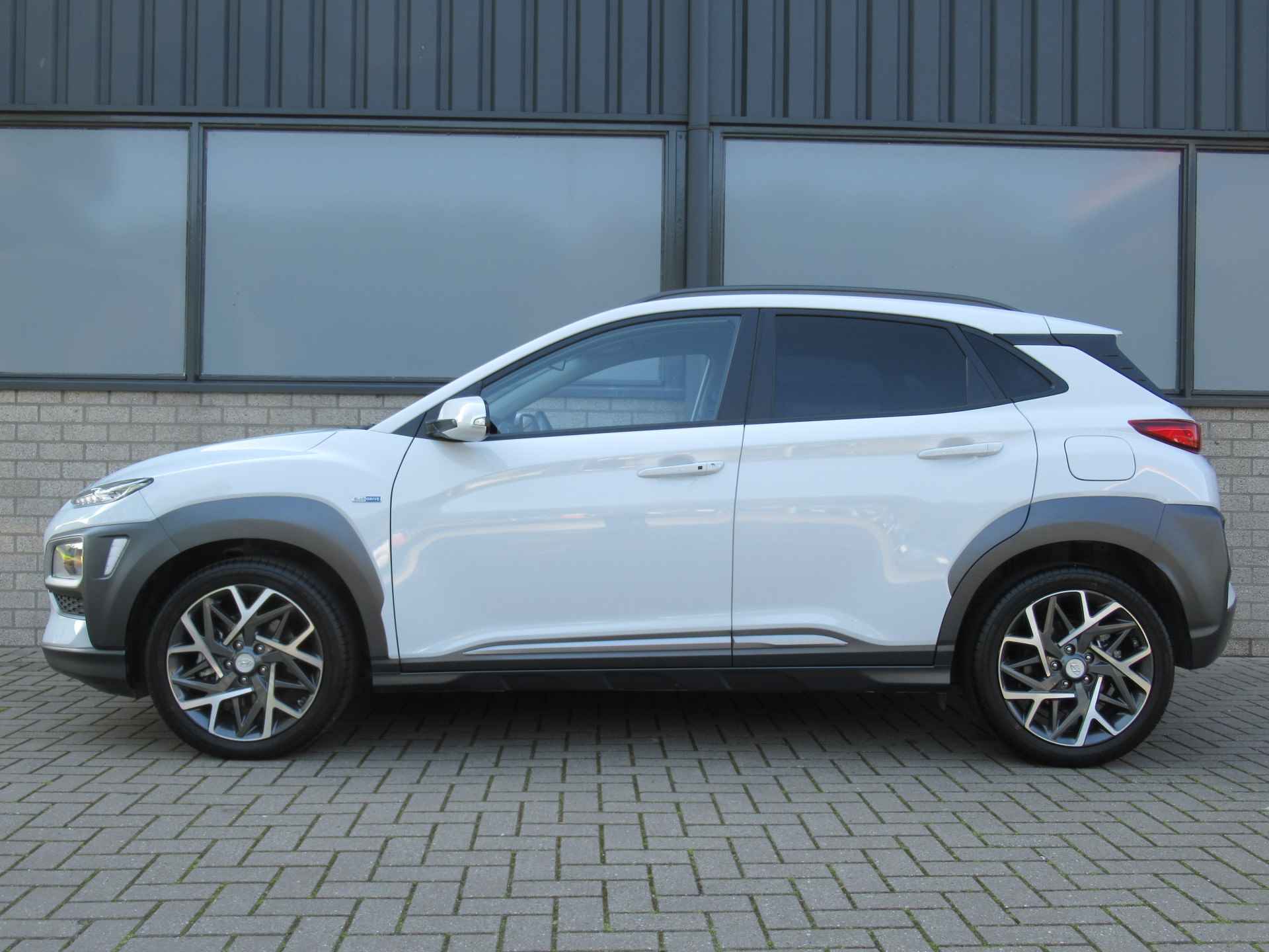 Hyundai KONA 1.6 GDI HEV Hybride 2e eigen |18"inch |camera| clima |half leder | keyless - 7/25