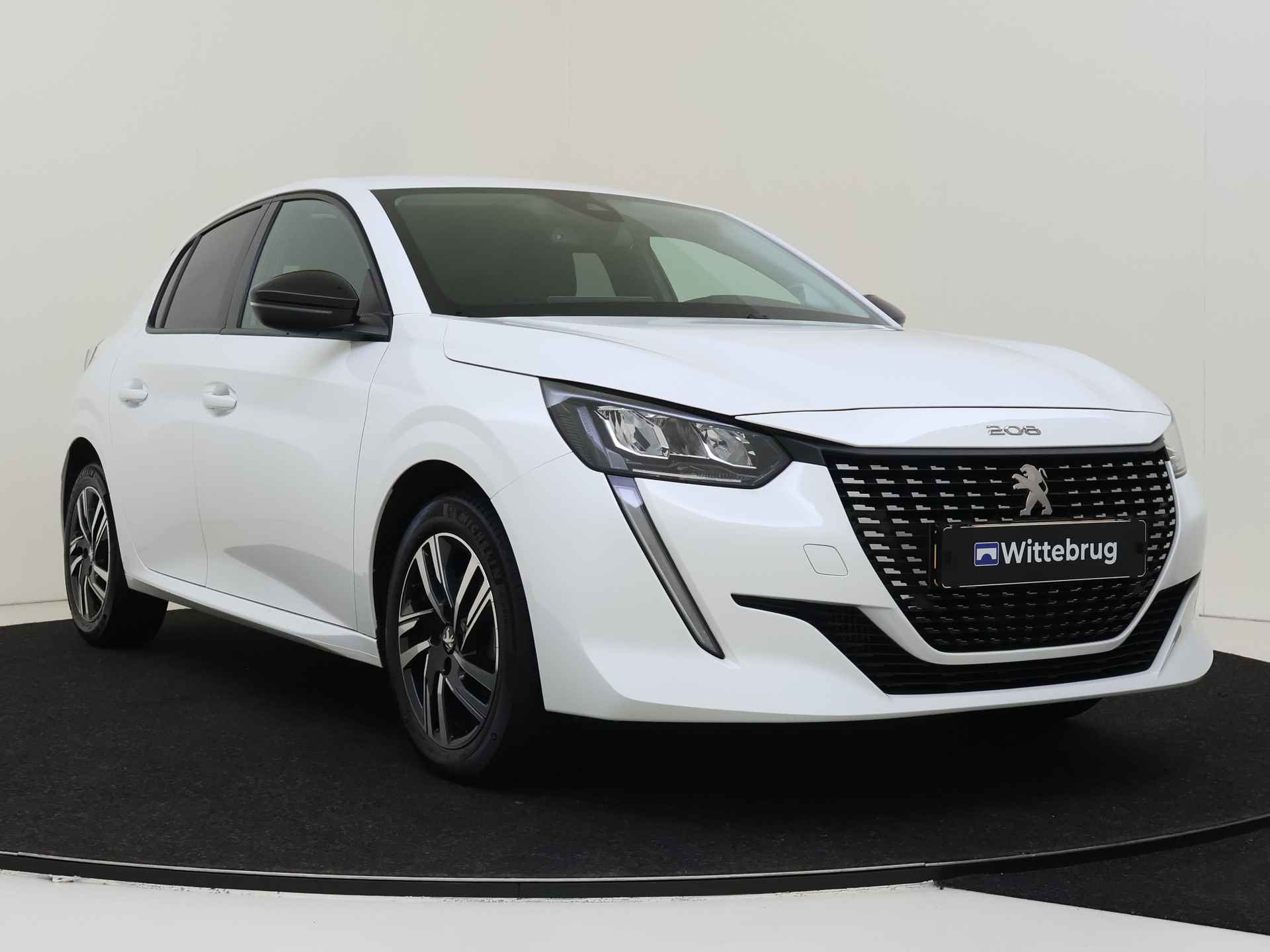 Peugeot 208 1.2 PureTech Allure Pack Automaat | Navigatie | Climate Control - 4/33