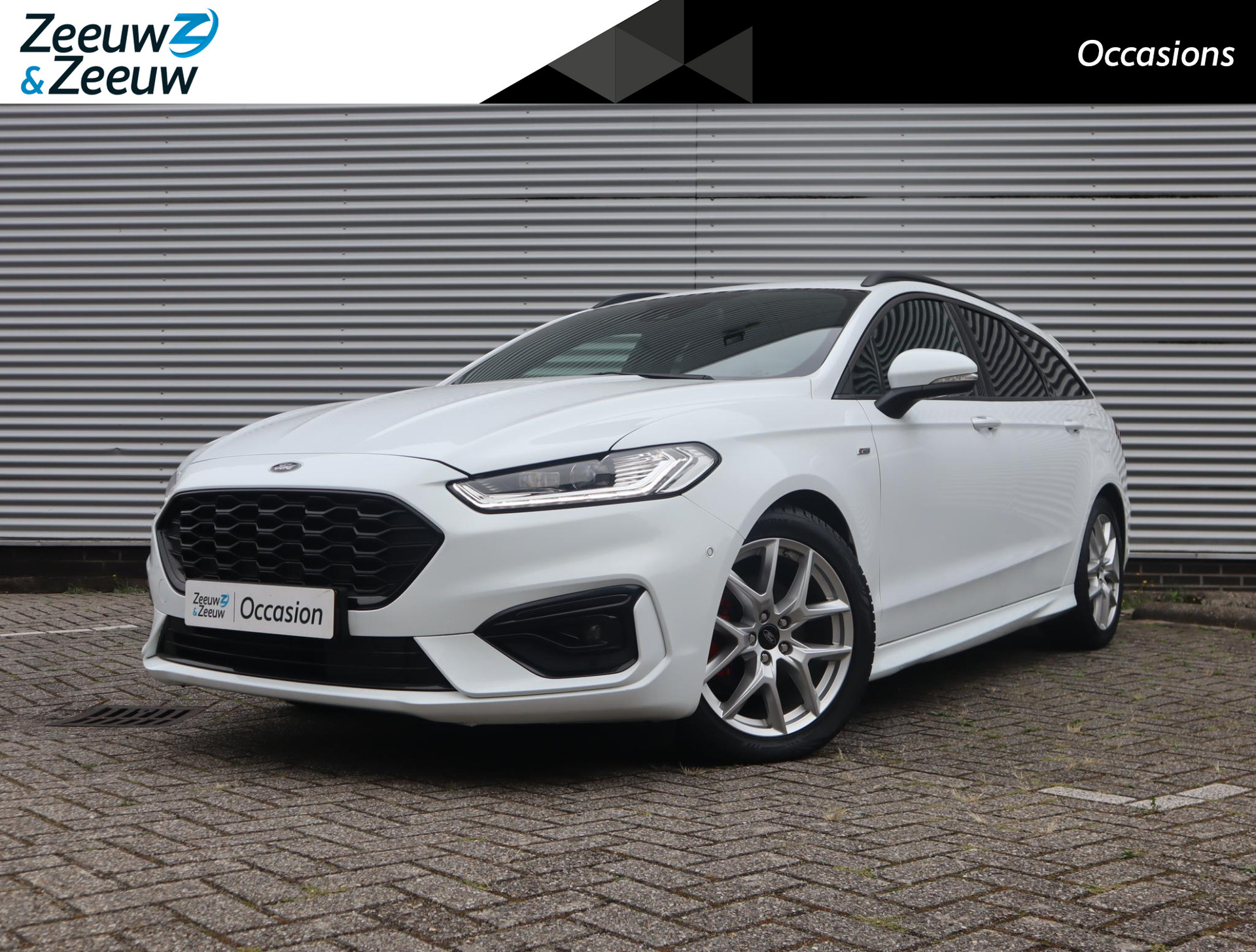 Ford Mondeo Wagon 2.0 IVCT HEV ST-Line | Elektrische Trekhaak | Elektrisch verstelbare voorstoelen | Halfleren bekleding |Stuur- Stoel en Voorruitverwarming | Camera | Apple Carplay & Android Auto | Parkeersensoren voor en achter | Keyless