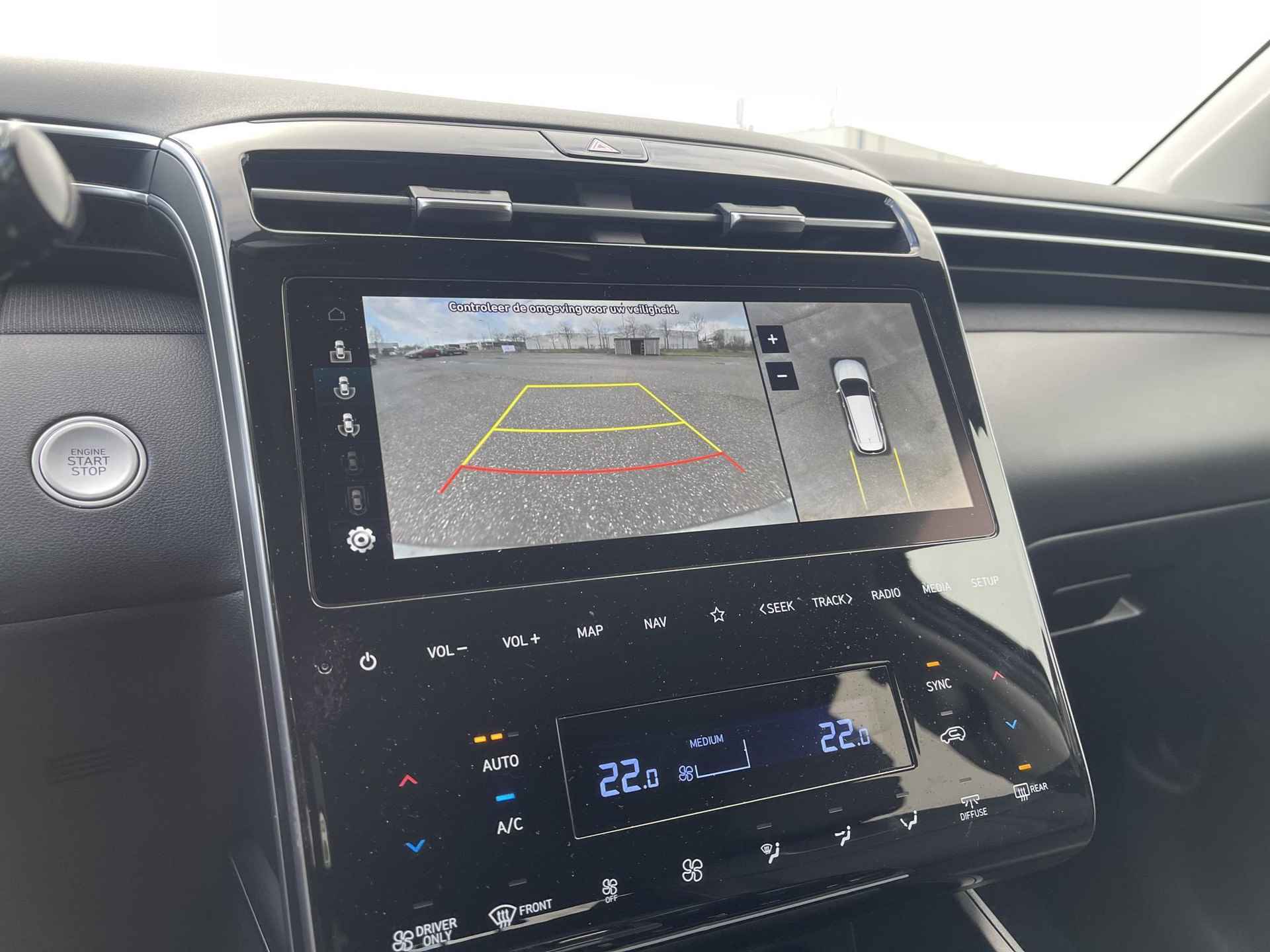 Hyundai Tucson 1.6 T-GDI HEV Premium | Vol-Leder | Digitaal Instrumentenpaneel | Adapt. Cruise Control | Apple Carplay/Android Auto | Stoelverwarming | Dodehoek Detectie | 360° Camera | Rijklaarprijs! - 17/30