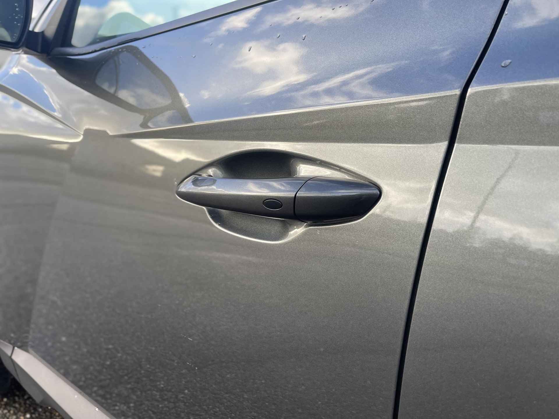 Hyundai Tucson 1.6 T-GDI HEV Premium | Vol-Leder | Digitaal Instrumentenpaneel | Adapt. Cruise Control | Apple Carplay/Android Auto | Stoelverwarming | Dodehoek Detectie | 360° Camera | Rijklaarprijs! - 27/30