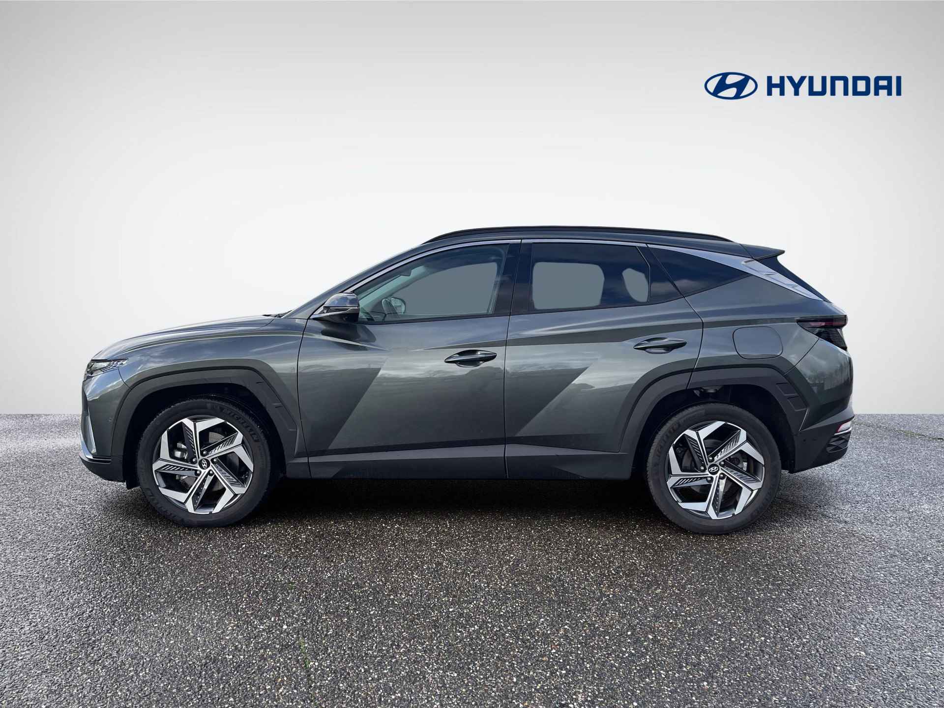 Hyundai Tucson 1.6 T-GDI HEV Premium | Vol-Leder | Digitaal Instrumentenpaneel | Adapt. Cruise Control | Apple Carplay/Android Auto | Stoelverwarming | Dodehoek Detectie | 360° Camera | Rijklaarprijs! - 7/30