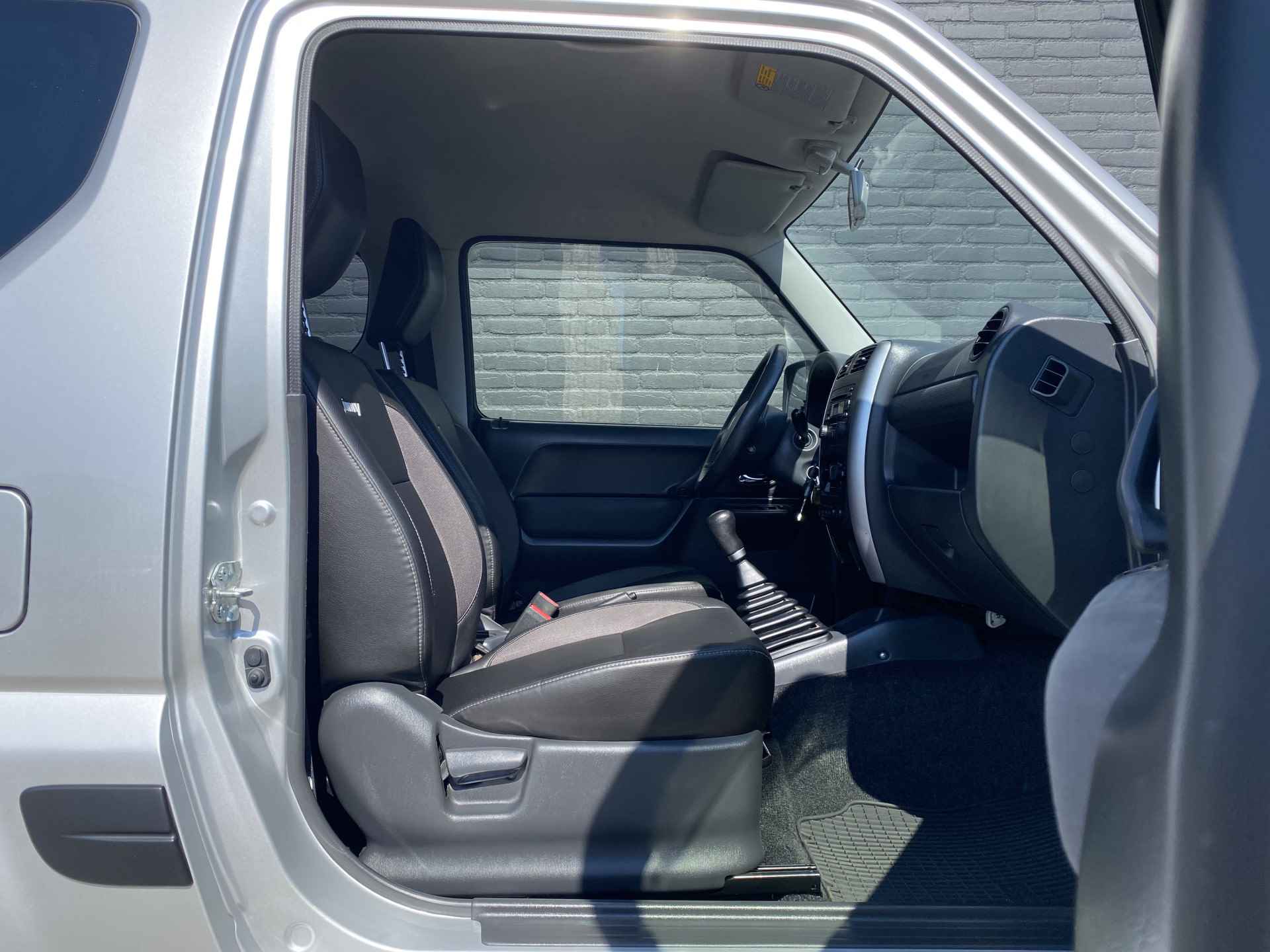 Suzuki Jimny 1.3 Exclusive | 1e eigenaar | dealer onderhouden | leder interieur | airco | trekhaak | bull/sidebar rvs - 24/36