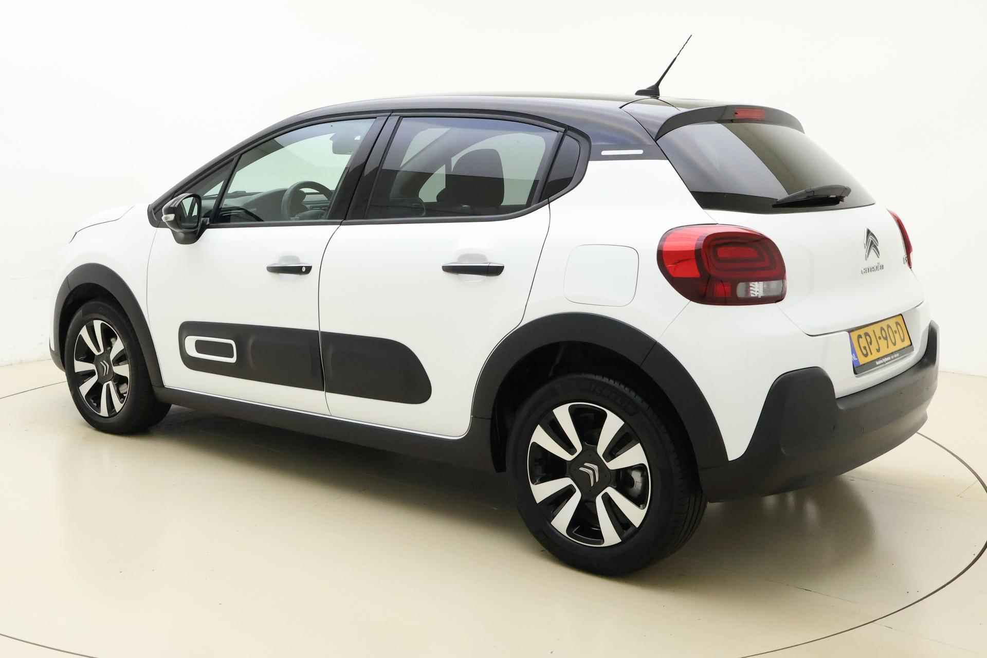 Citroen C3 1.2 PureTech Feel Edition 110 PK Automaat | Navigatie via Apple Carplay | Climate control | Parkeersensoren | Keyless start | Getint glas | Zwart dak - 4/31