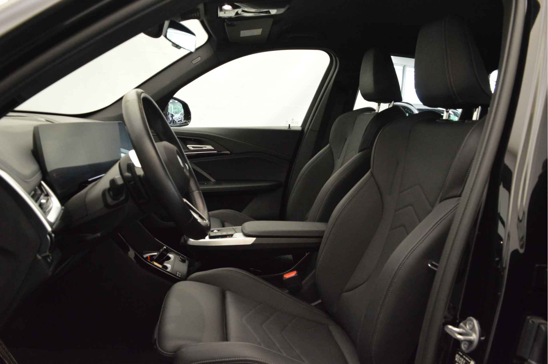 BMW X1 xDrive30e M Sport Automaat / Adaptieve LED / Sportstoelen / Adaptief M Onderstel / Comfort Access / Widescreen Display / Parking Assistant - 6/21