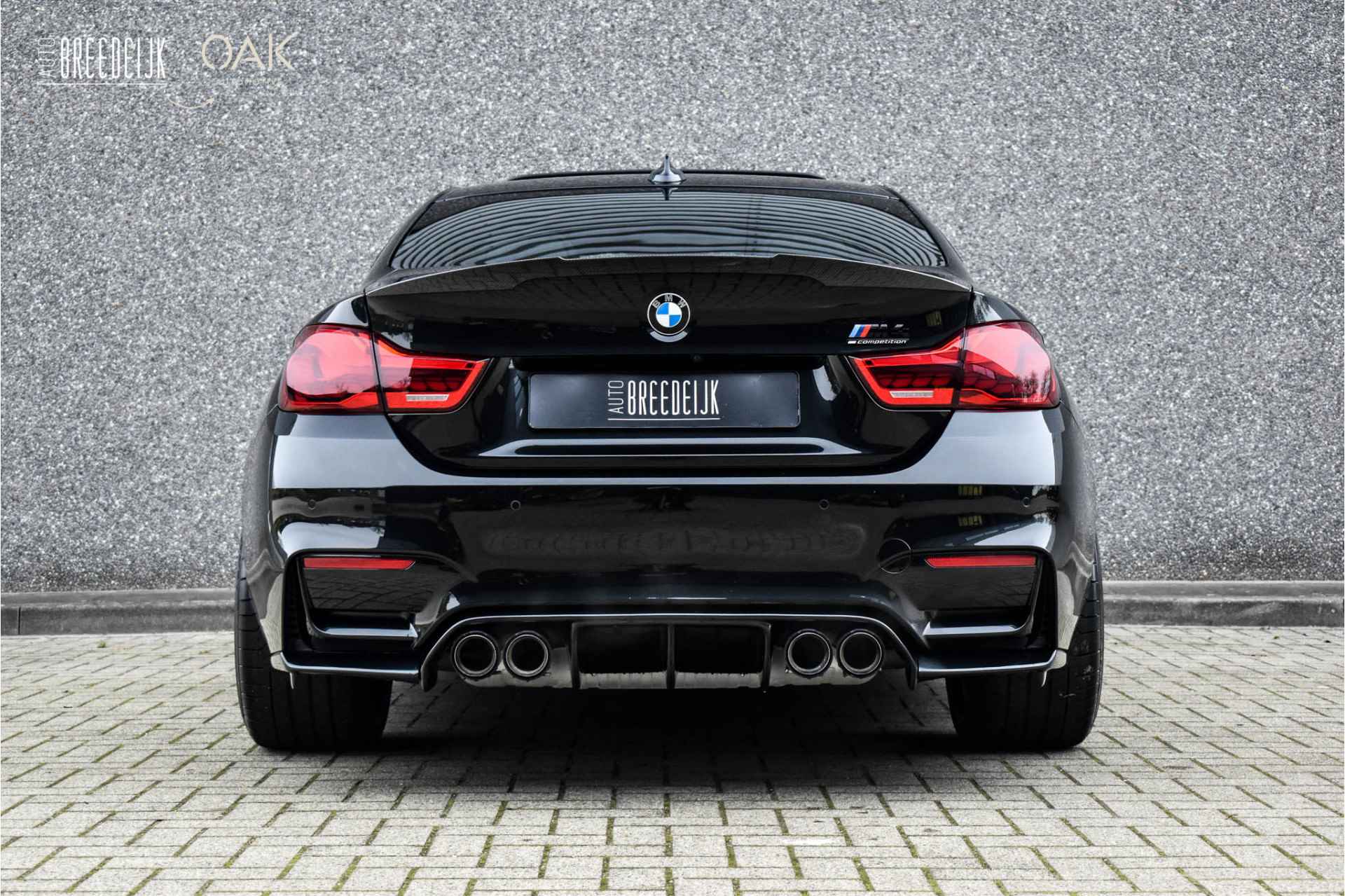 BMW 4 Serie Coupé M4 Competition | NaviProf | Schuifdak | 20" LM | Performance Uitlaat | LED | Camera | Sapphire Zwart - 12/24