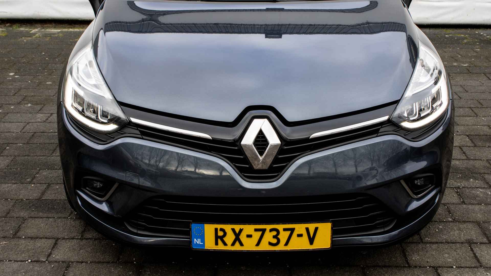 Renault Clio Estate 1.5 dCi Ecoleader Intens Navigatie/ Pdc/ Tel. bluetooth/ Cruise control/ Half leer/ Lmv - 26/29