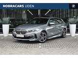 BMW 1-serie 118i High Executive M Sport Automaat / Panoramdak / Trekhaak / Sportstoelen / Stoelverwarming / LED / Parking Assistant / Live Cockpit Professional / M Sport steering