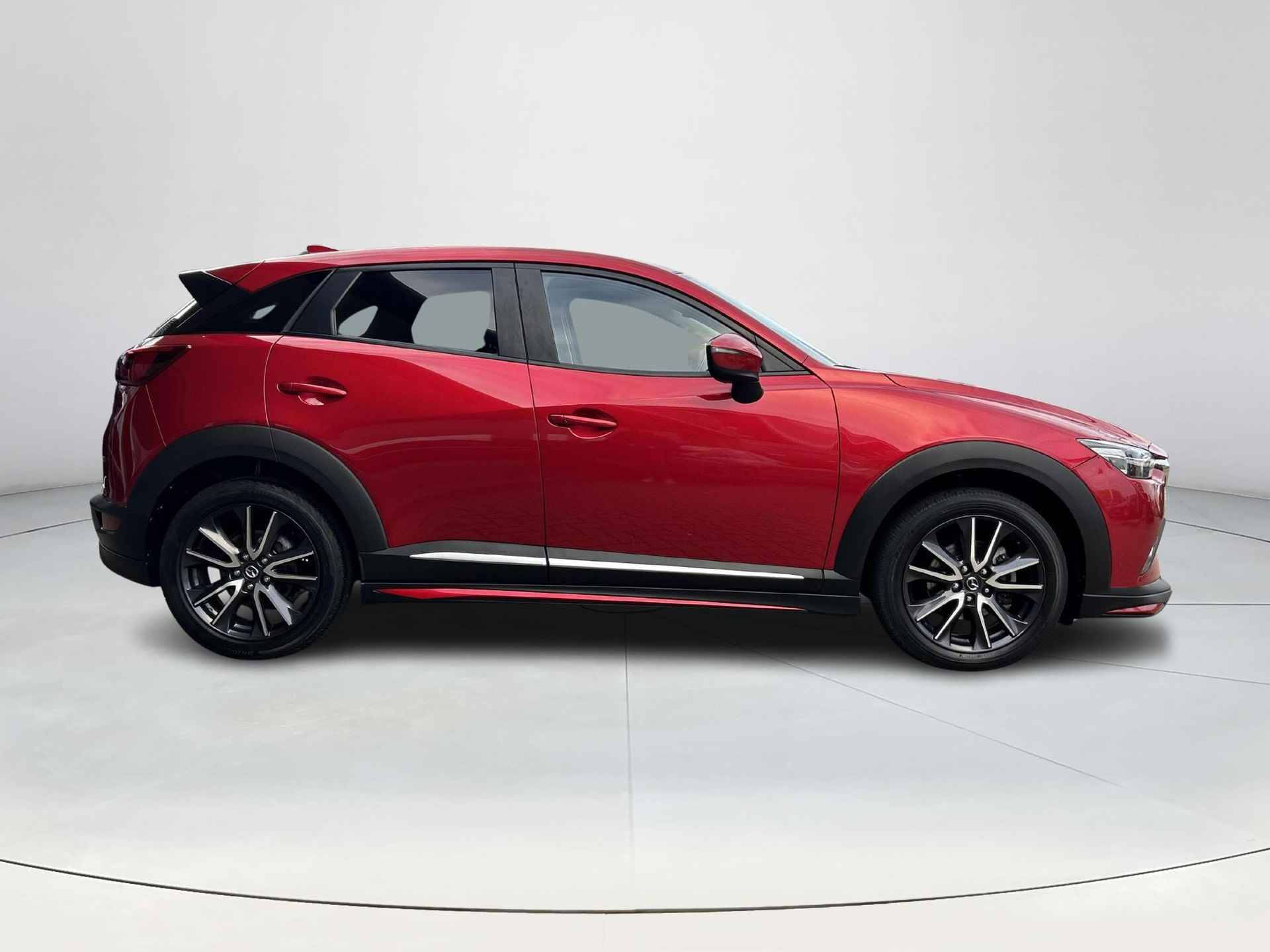 Mazda CX-3 2.0 SkyActiv-G 120 GT-M Aero Pack | Rijklaarprijs! | Trekhaak! | Bose | Navi | Camera | LM velgen | Climate Control | Adaptive Cruise Control | Inclusief 36 mnd Garantie! | - 7/37