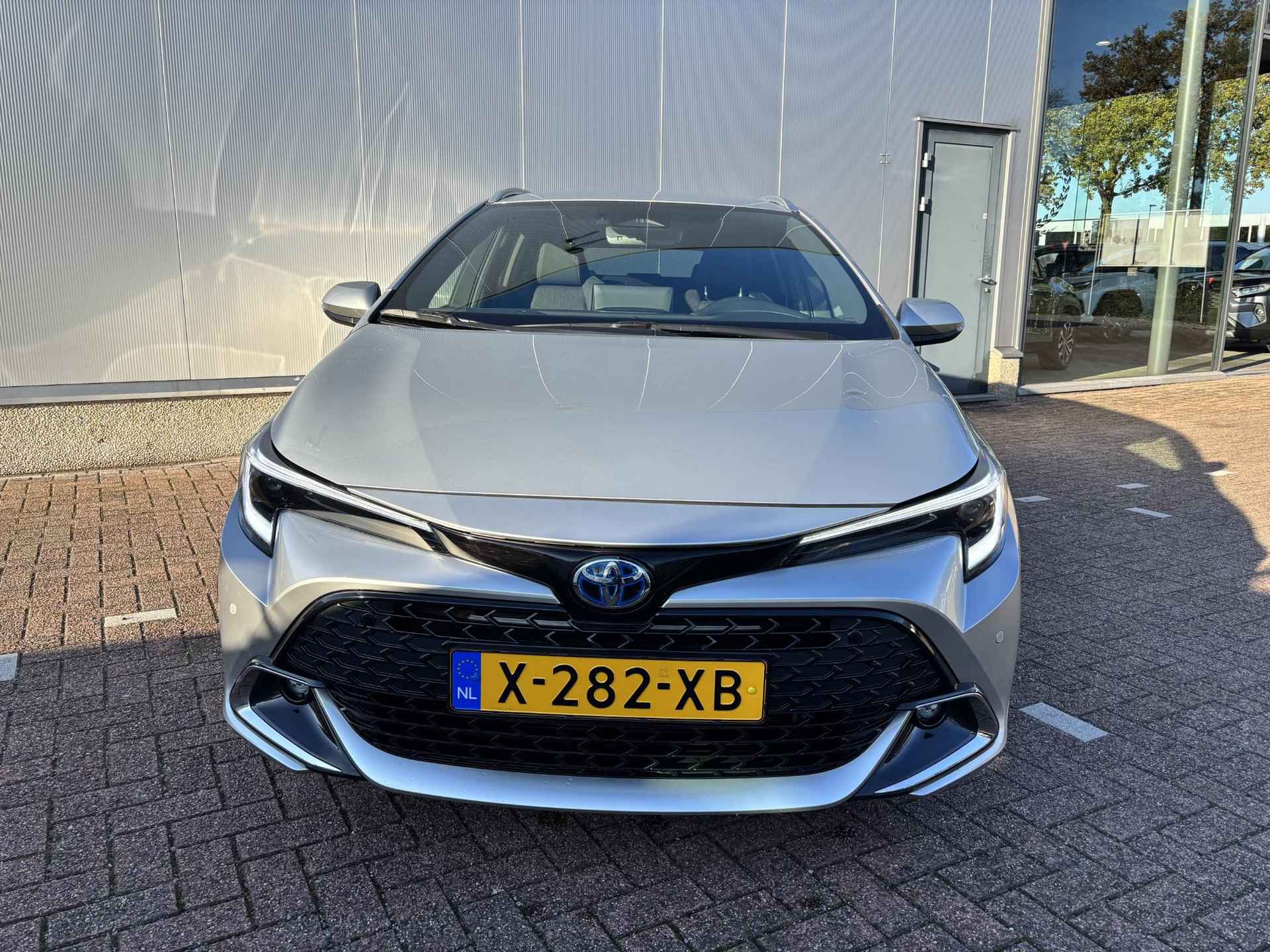 Toyota Corolla Touring Sports 1.8 Hybrid First Edition Apple Carplay Android Auto, Parkeersensoren voor en achter, camera - 5/46