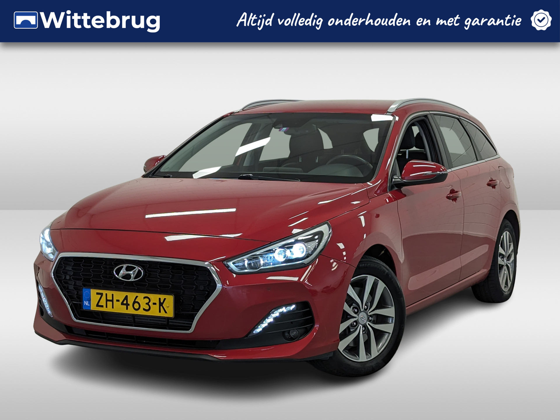 Hyundai i30 Wagon 1.4 T-GDI Premium 7DCT AUTOMAAT | NAVIGATIE | HALF LEDER BEKLEDING | LAGE KILOMETERSTAND! bij viaBOVAG.nl