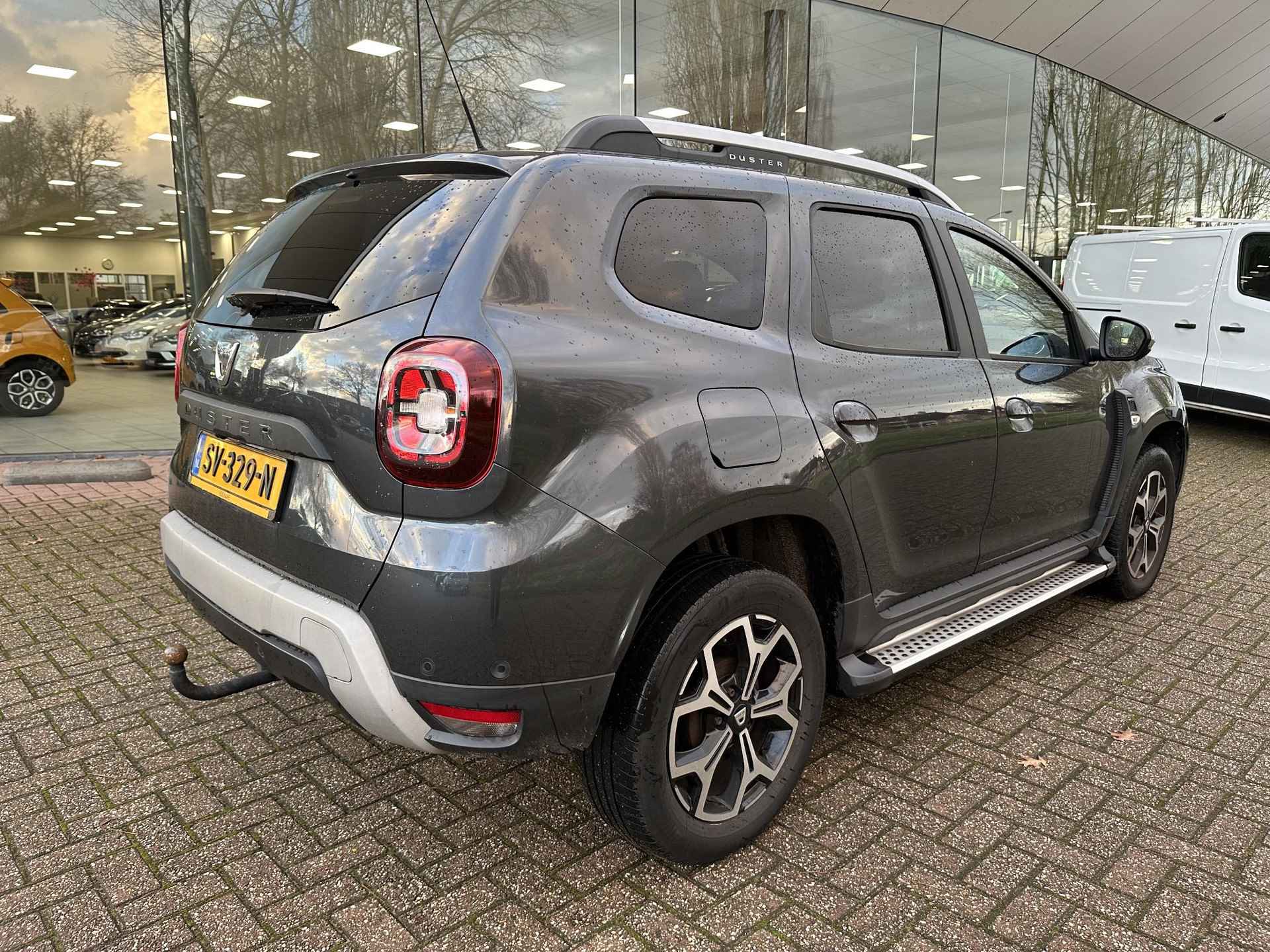 Dacia Duster 1.2 TCe 125 4x4 Prestige | Trekhaak | Navi | Clima | Leder | Cruise | Keyless | 360° camera | NL-auto + dealer onderhouden! - 3/27