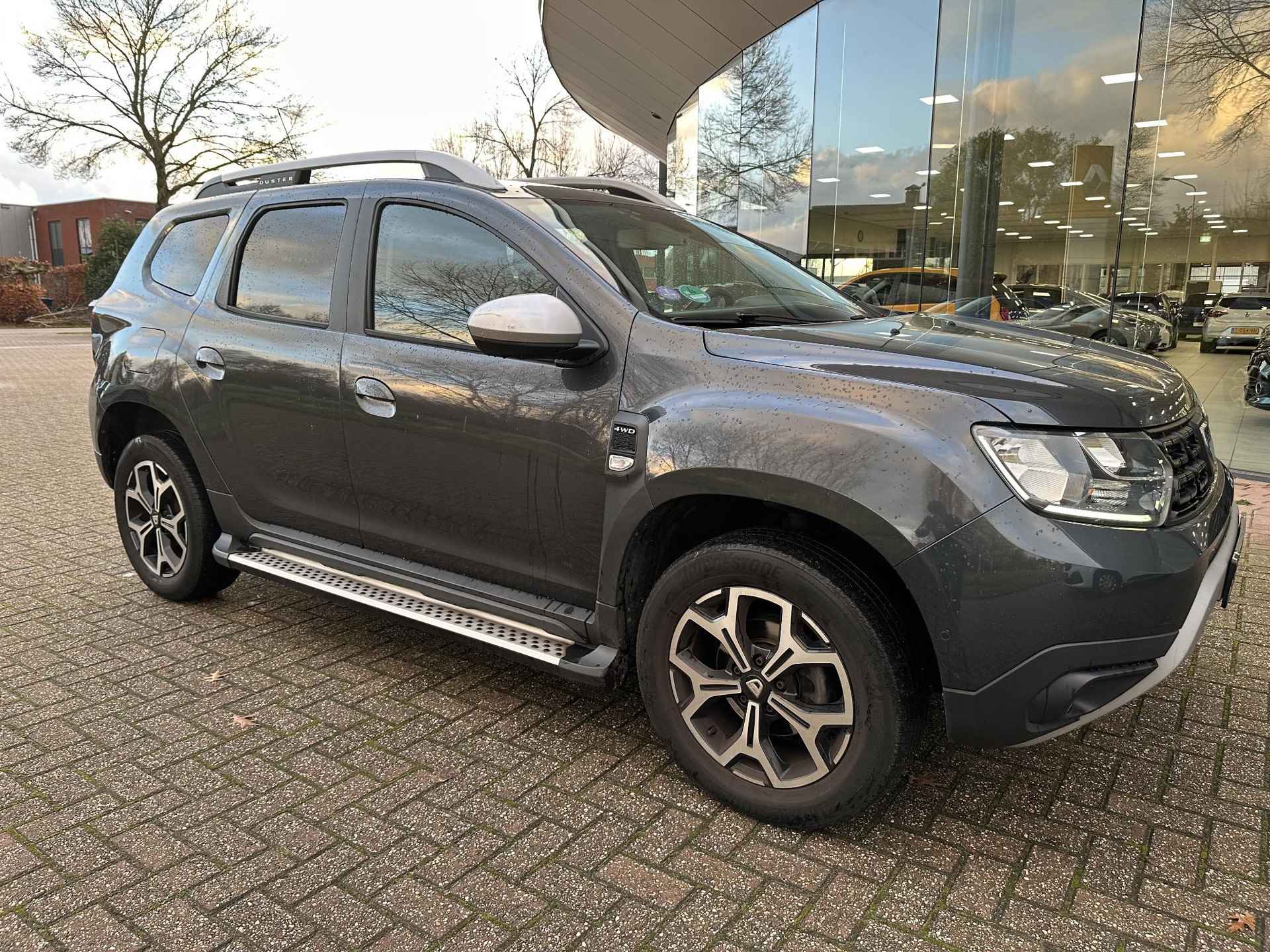 Dacia Duster 1.2 TCe 125 4x4 Prestige | Trekhaak | Navi | Clima | Leder | Cruise | Keyless | 360° camera | NL-auto + dealer onderhouden! - 6/27