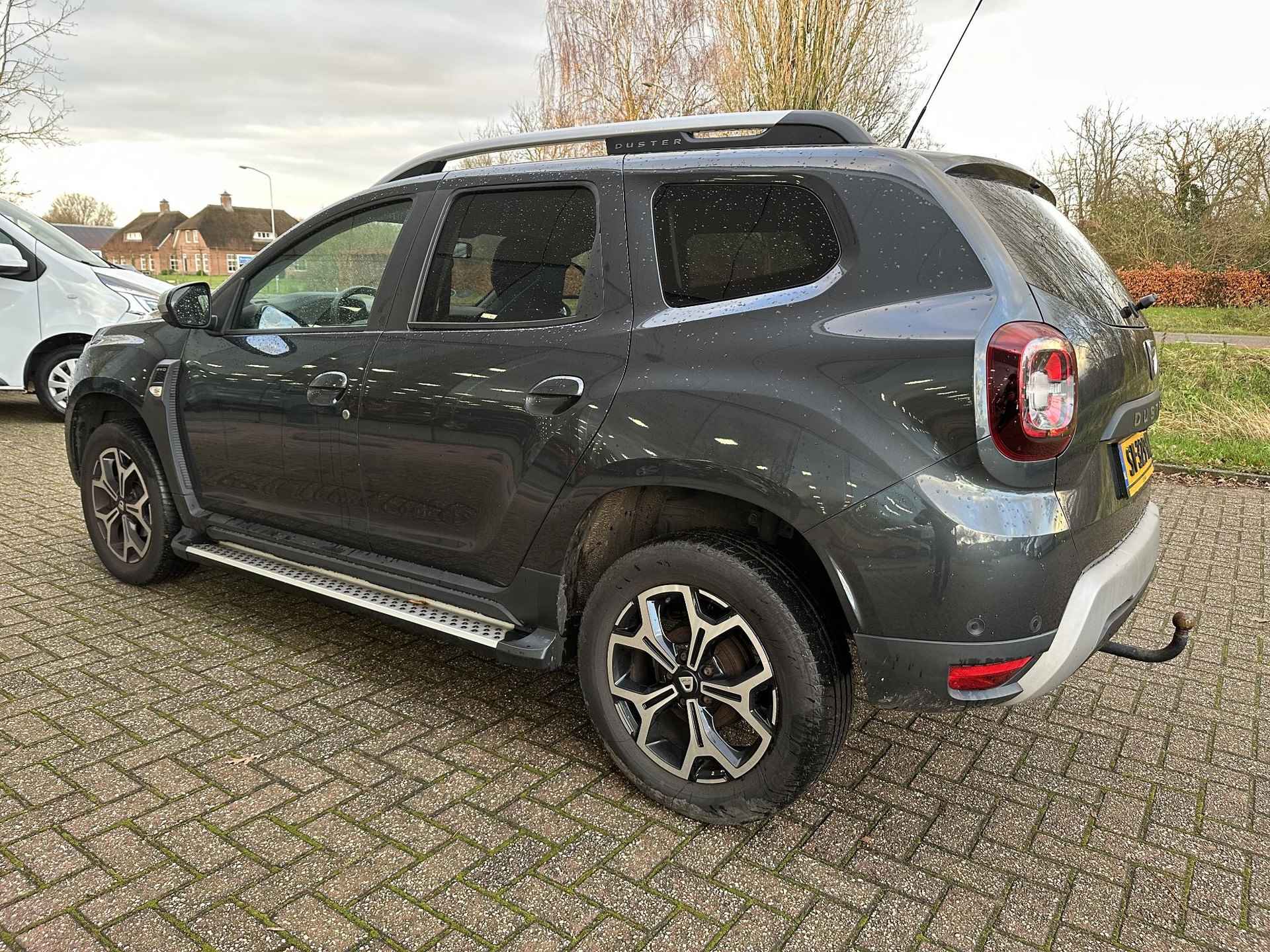 Dacia Duster 1.2 TCe 125 4x4 Prestige | Trekhaak | Navi | Clima | Leder | Cruise | Keyless | 360° camera | NL-auto + dealer onderhouden! - 7/27