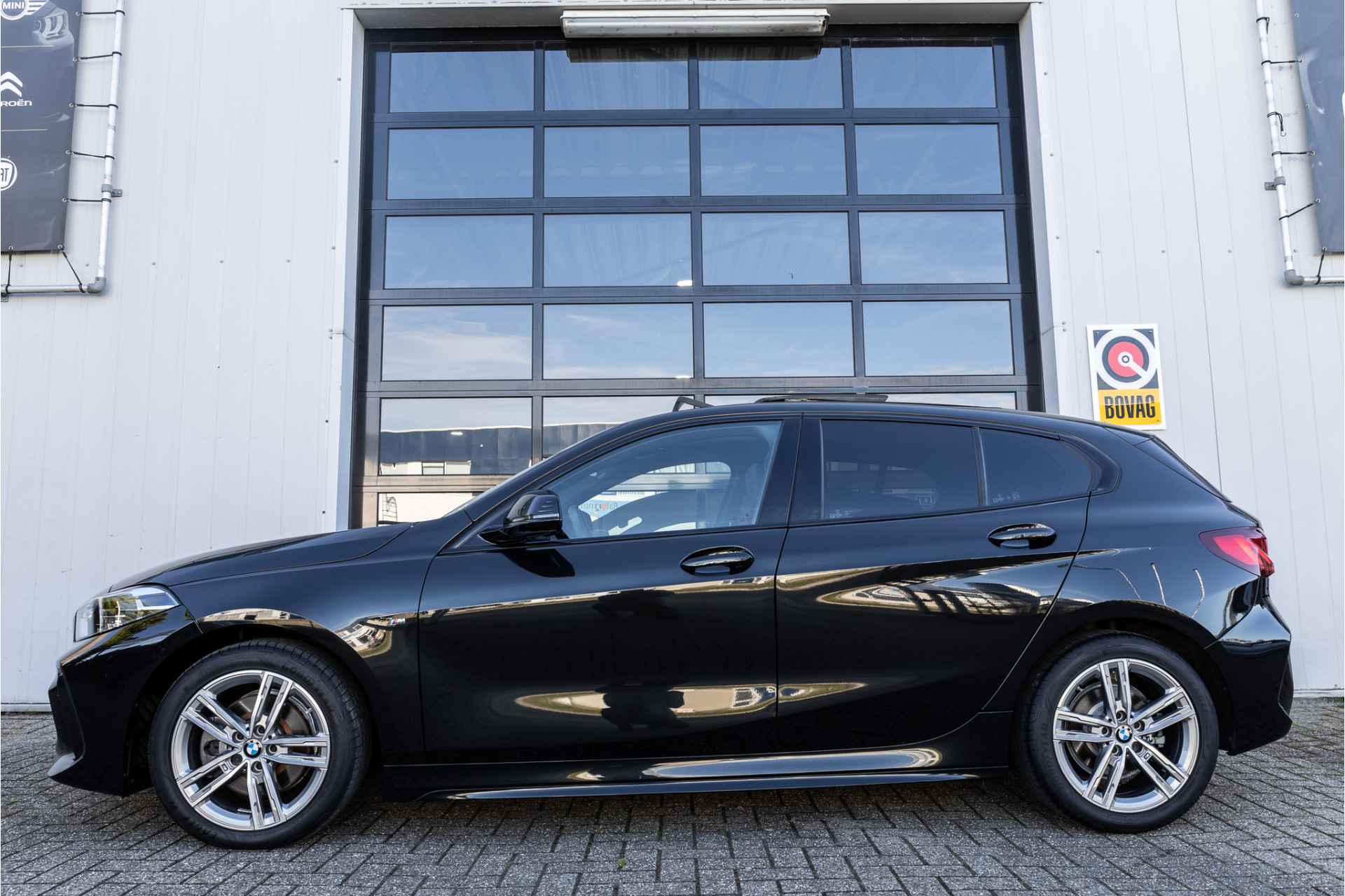 BMW 1-serie 118i M Sport ✅ALS NIEUW! ✅PANO✅BTW✅Dealeronderhouden✅1JaarBOVAG - 5/30