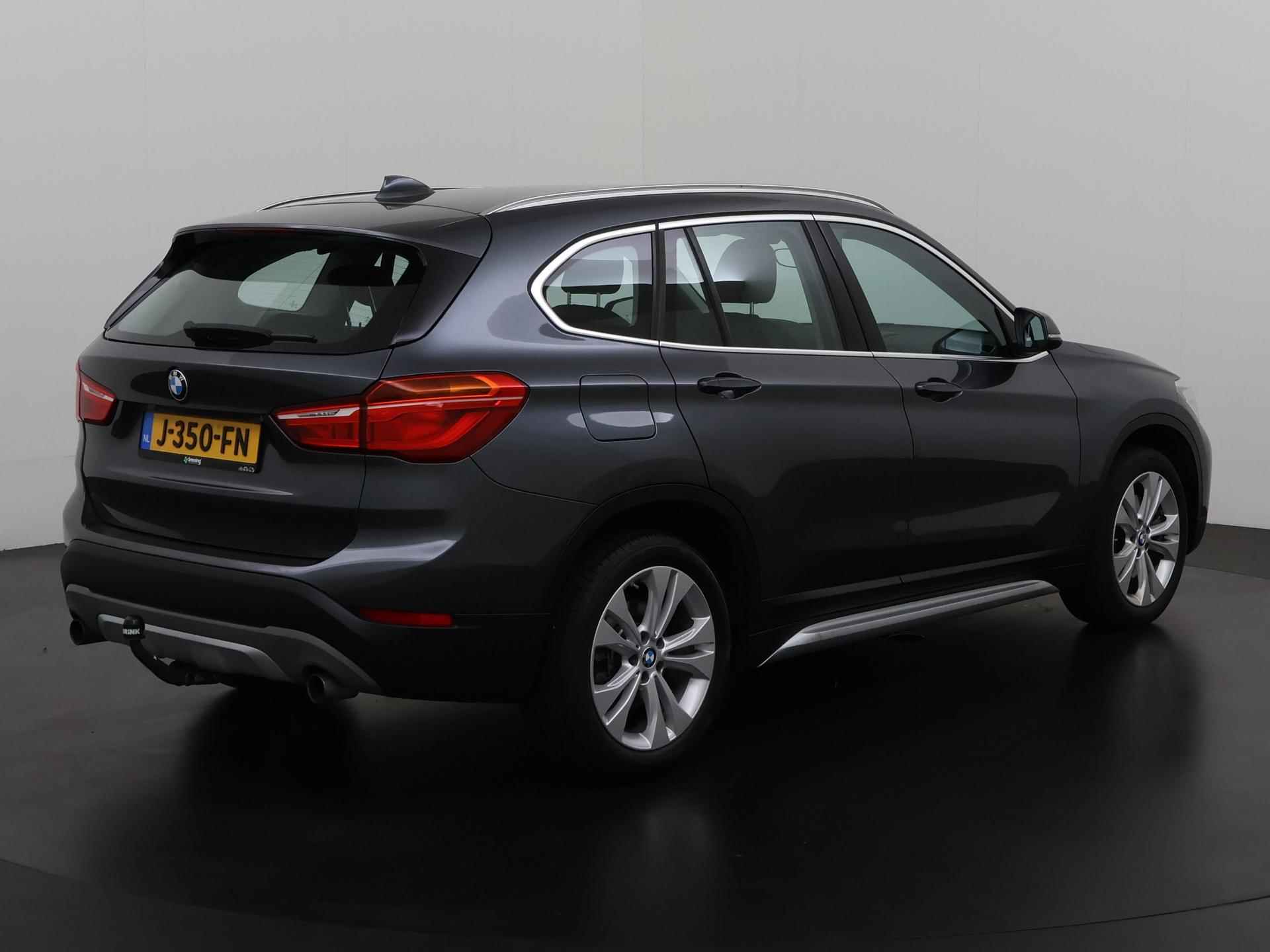 BMW X1 sDrive20i Centennial High Executive | Trekhaak | Head Up | Leder | Zondag Open! - 4/36