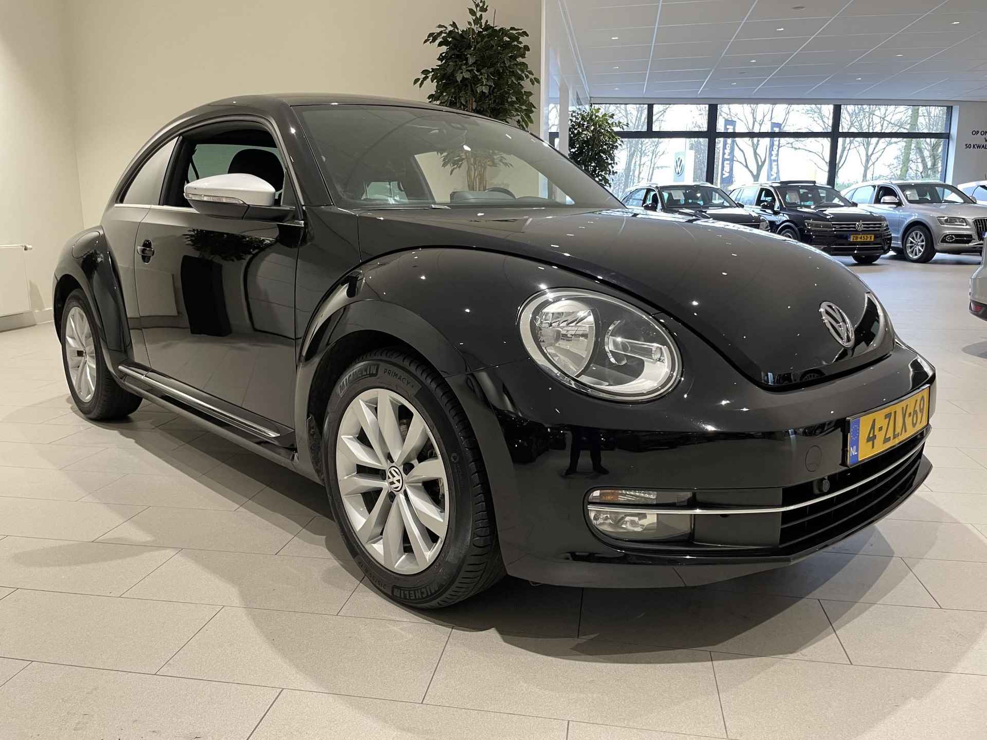 Volkswagen Beetle 1.2 TSI Design BlueMotion 105 PK | Stoelverwarming | Parkeersensoren | Navigatie | Climate Control | Cruise Control | Bluetooth | Radio | - 8/28