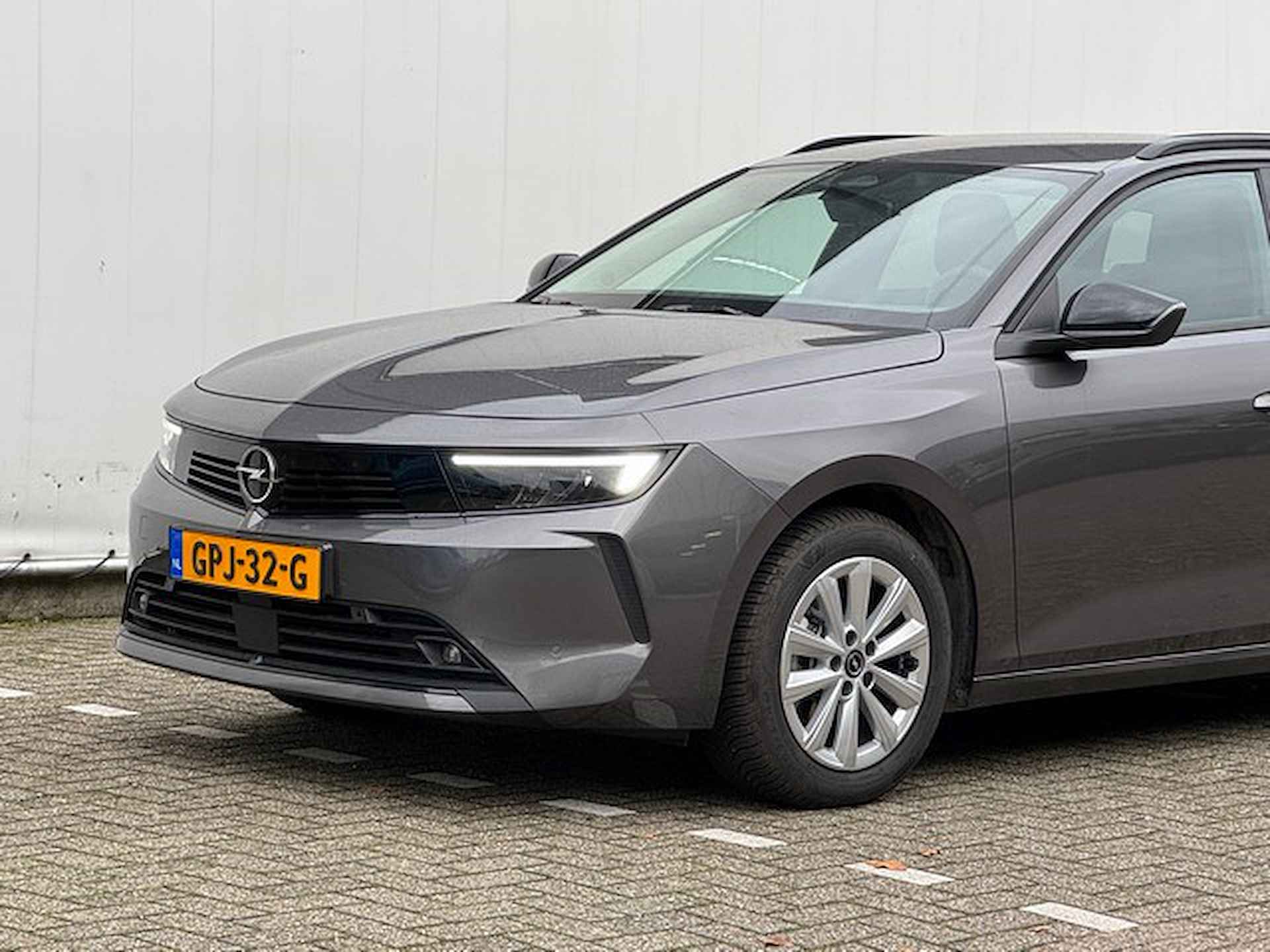 Opel Astra Sports Tourer 1.2 Turbo Business Edition met Navi/Camera, Winterpakket, All Season - 18/21