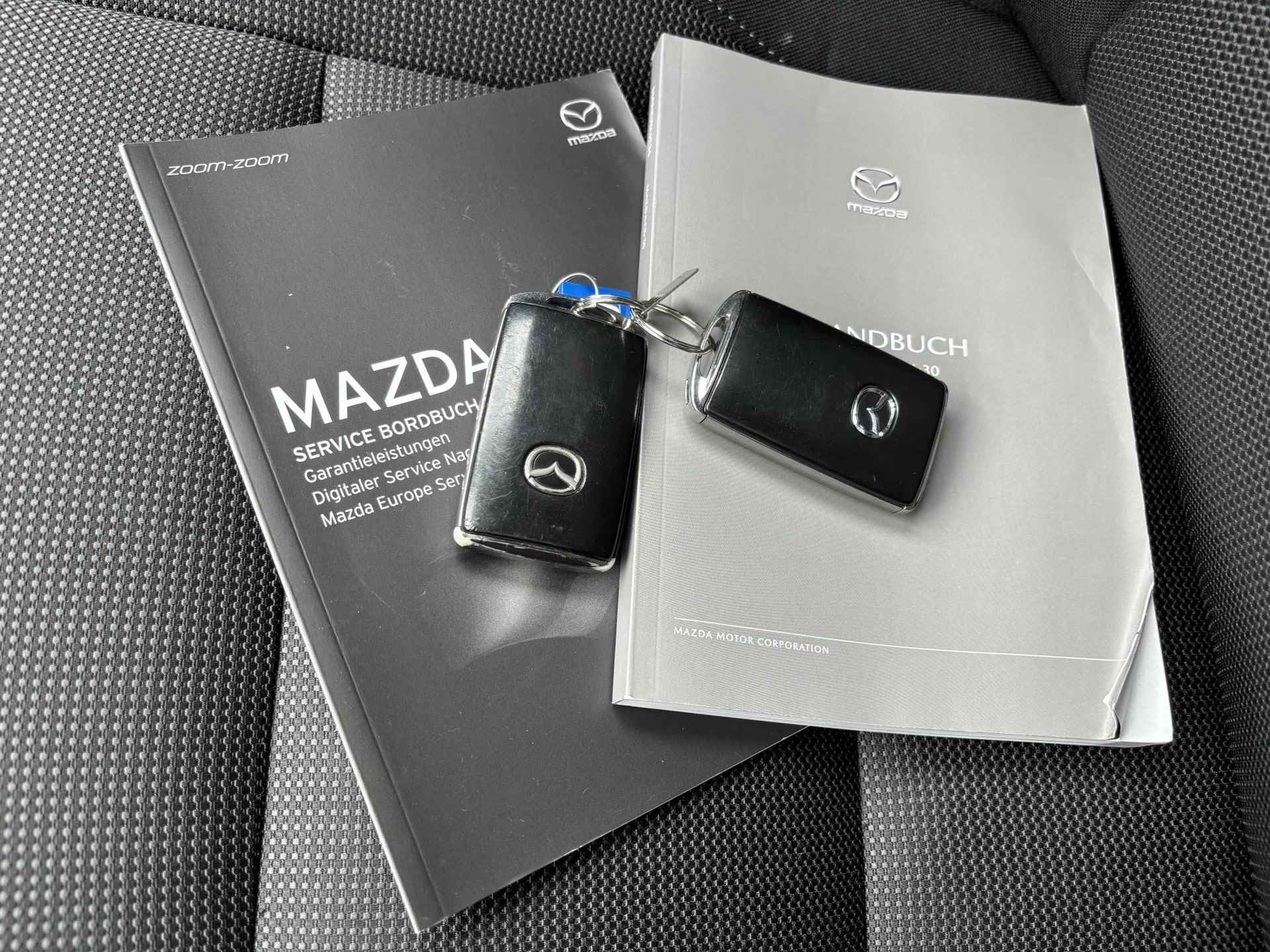 Mazda CX-30 2.0 e-SkyActiv-X M Hybrid Comfort | 360 CAMERA | BOSE | DEALERONDERHOUDEN | - 32/35